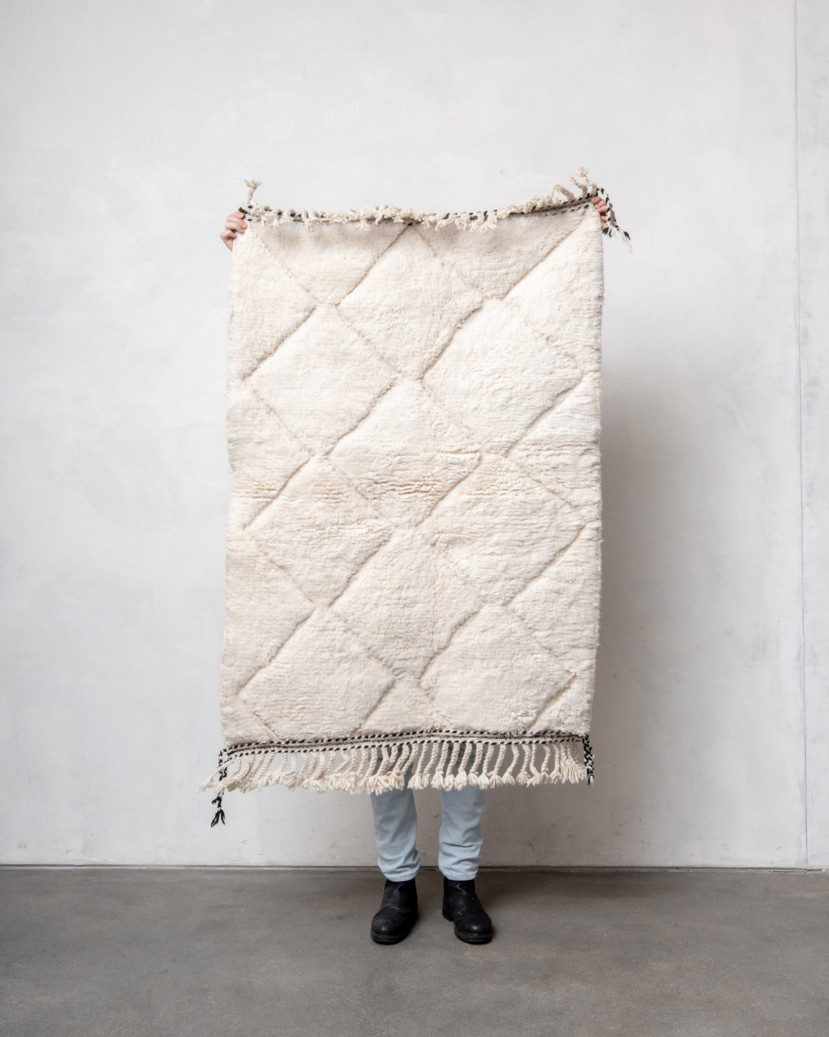 Modern, designer, handcrafted Berber rug from Morocco. Beniourain carpet with minimalist design, natural wool pile and a fluffy texture.