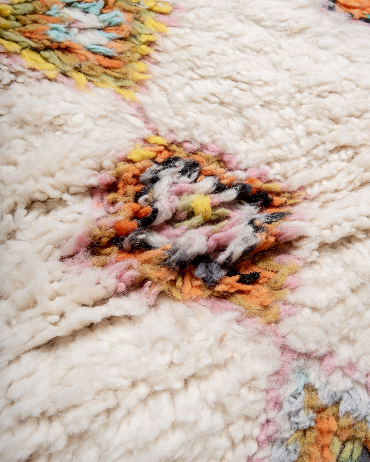 Modern, designer, handcrafted Berber rug from Morocco. Beniourain carpet with beautiful colours and patterns and fluffy wool texture.