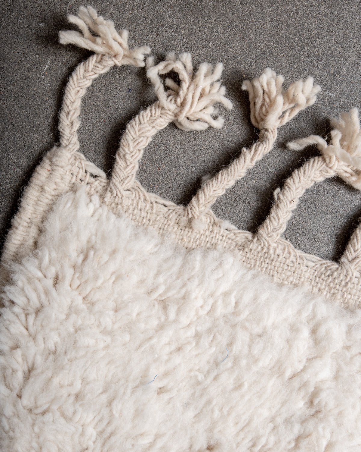 Modern, designer, handcrafted Berber rug from Morocco. Beniourain carpet with minimalist design, natural wool pile and a fluffy texture.