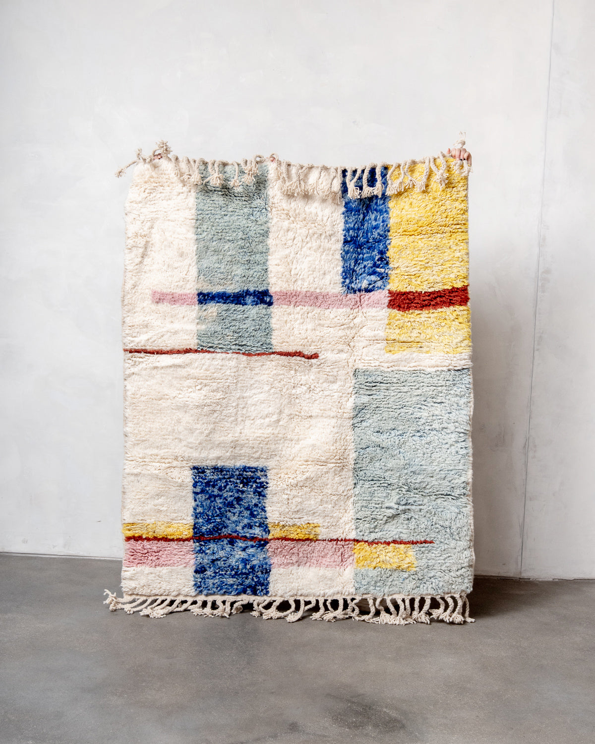 Modern, designer, handcrafted Berber rug from Morocco. Beniourain carpet with beautiful colours and patterns and fluffy wool texture.