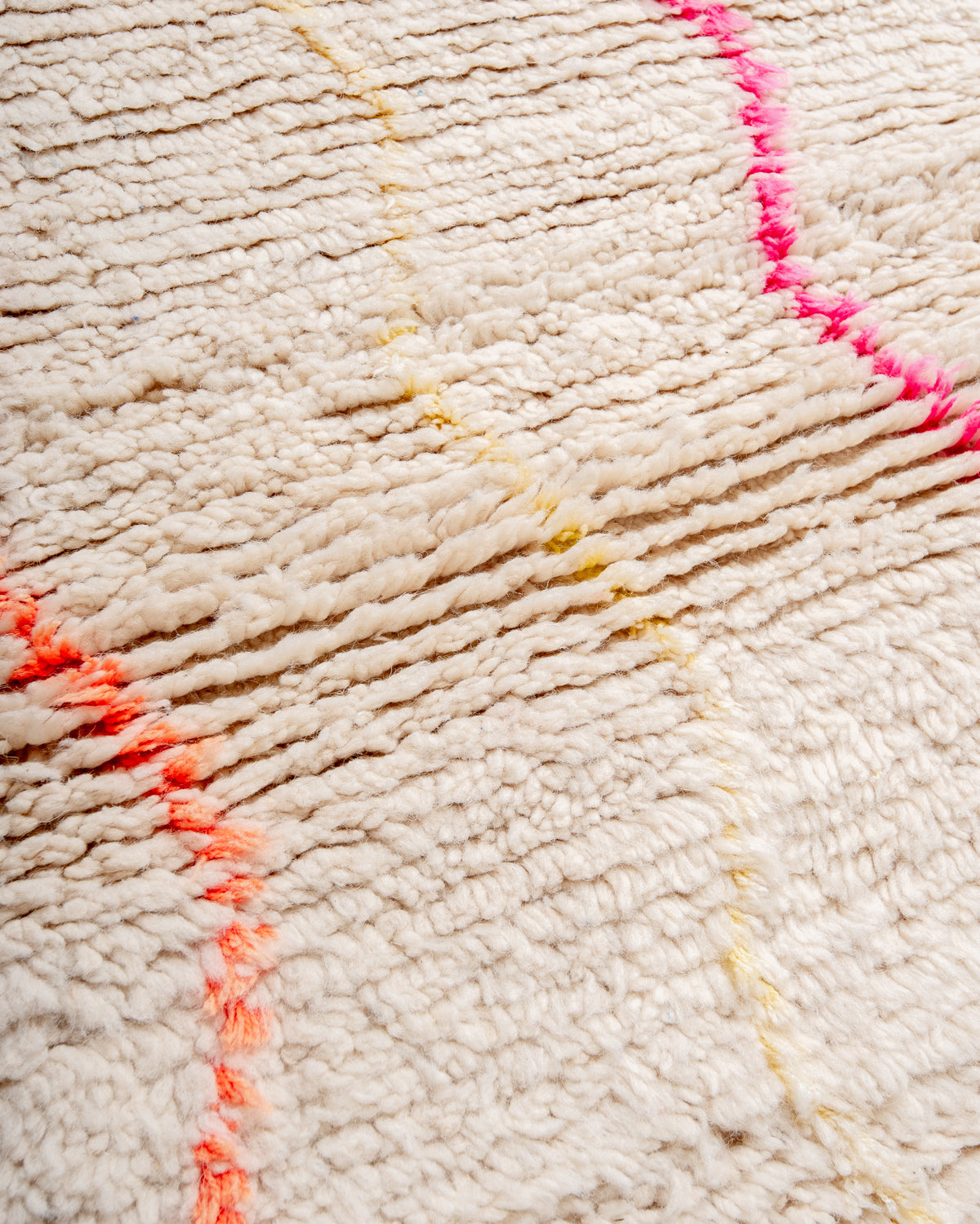 Modern, designer, handcrafted Berber rug from Morocco. Beniourain carpet with beautiful colours and patterns and fluffy wool texture.