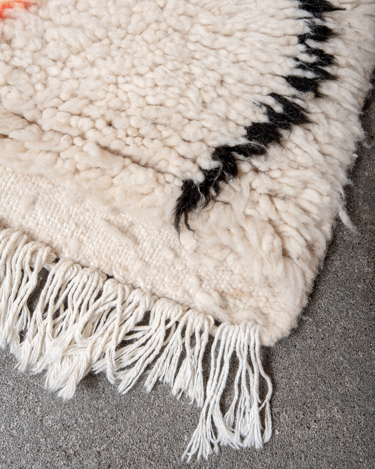 Modern, designer, handcrafted Berber rug from Morocco. Beniourain carpet with beautiful colours and patterns and fluffy wool texture.