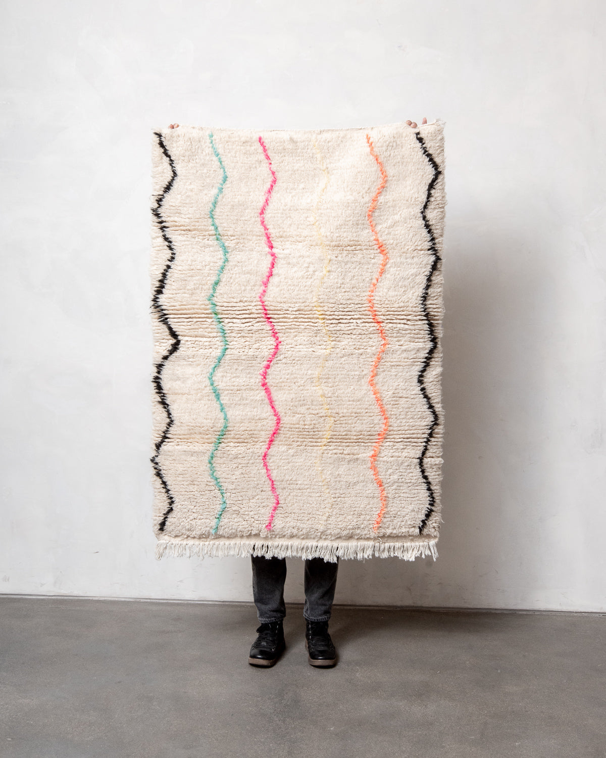 Modern, designer, handcrafted Berber rug from Morocco. Beniourain carpet with beautiful colours and patterns and fluffy wool texture.