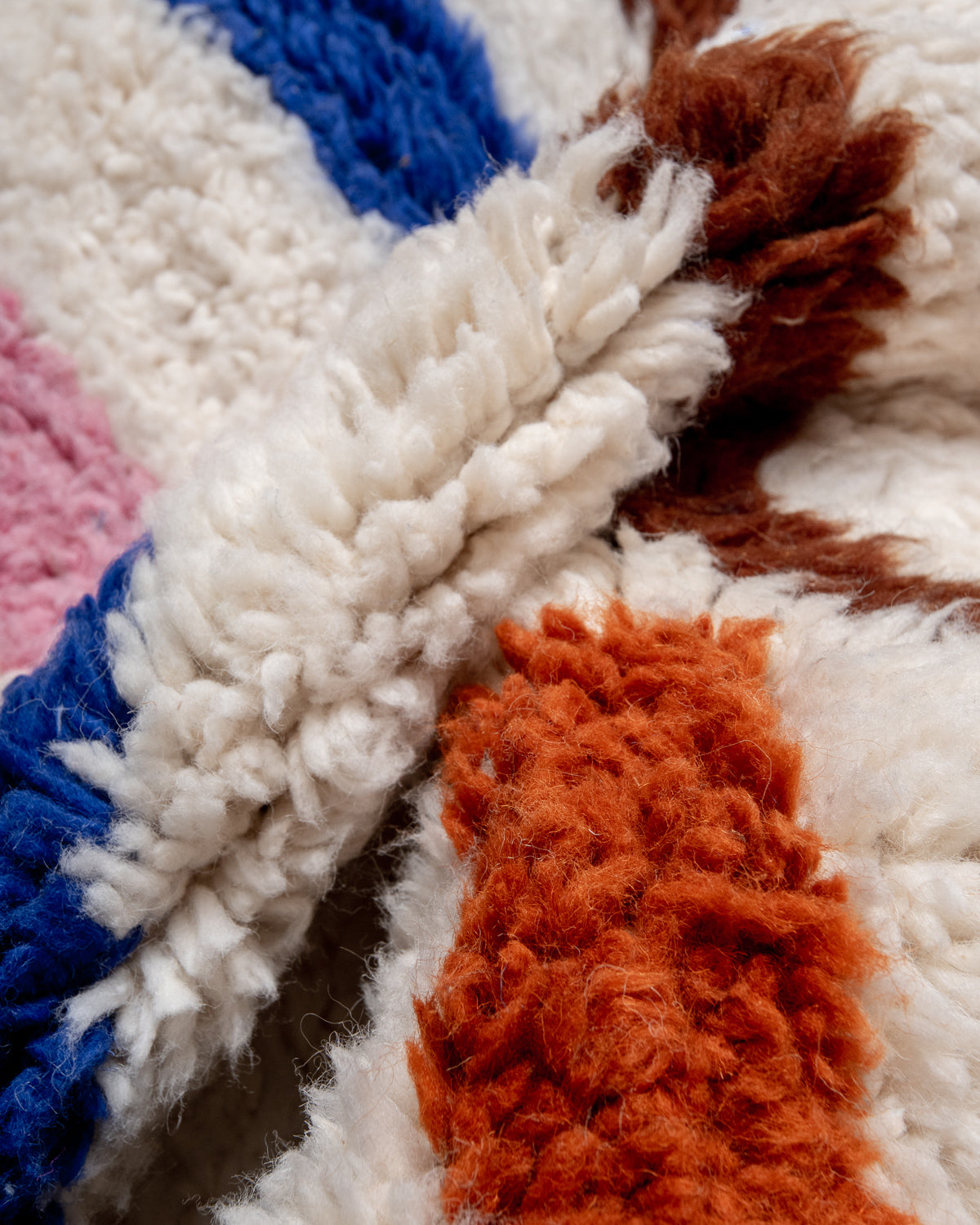 Modern, designer, handcrafted Berber rug from Morocco. Beniourain carpet with beautiful colours and patterns and fluffy wool texture.