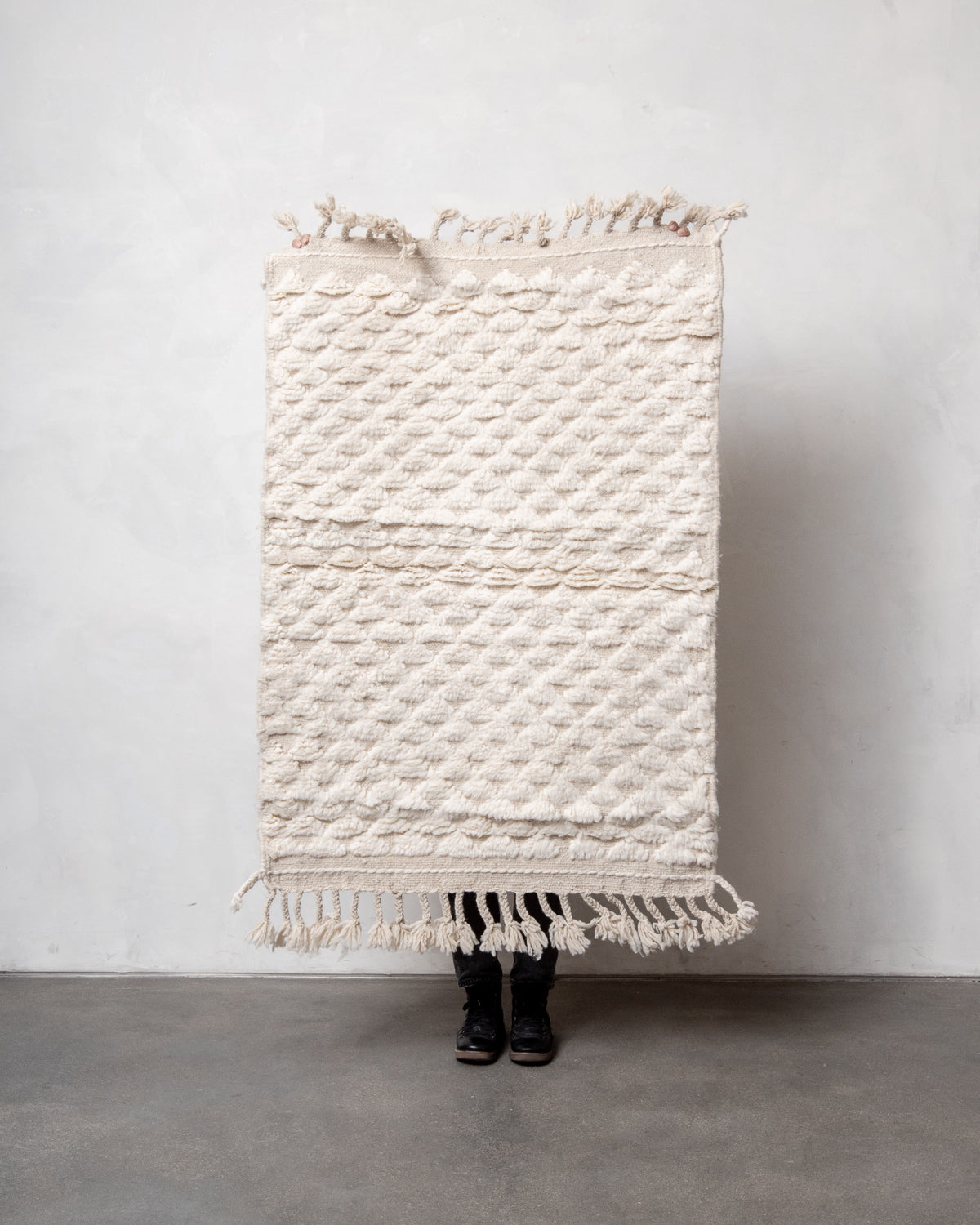 Modern, designer, handcrafted Berber rug from Morocco. Beniourain carpet with minimalist design, natural wool pile and a fluffy texture.