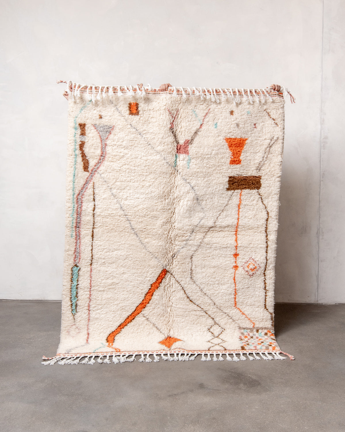 Modern, designer, handcrafted Berber rug from Morocco. Beniourain carpet with beautiful colours and patterns and fluffy wool texture.