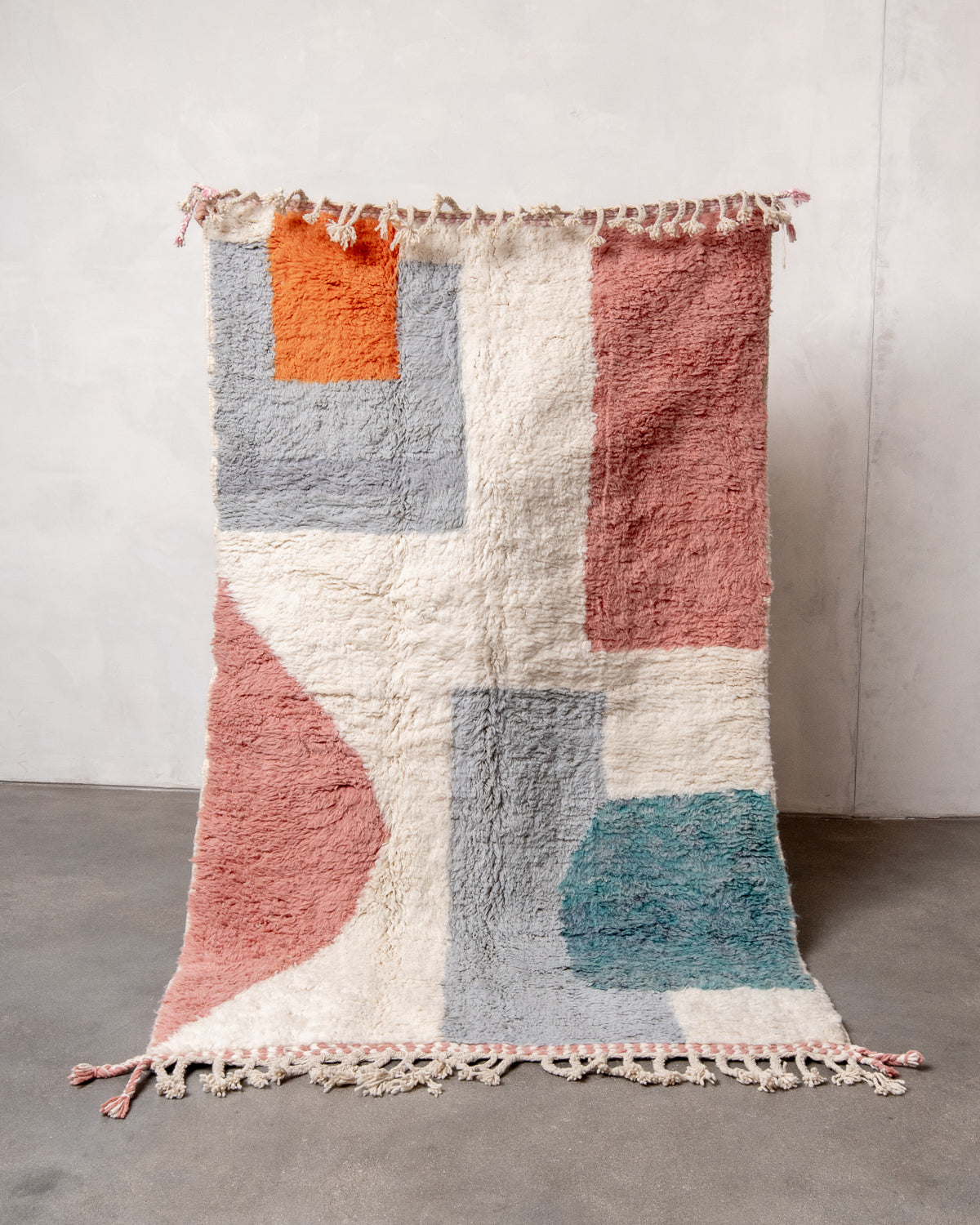 Modern, designer, handcrafted Berber rug from Morocco. Beniourain carpet with beautiful colours and patterns and fluffy wool texture.