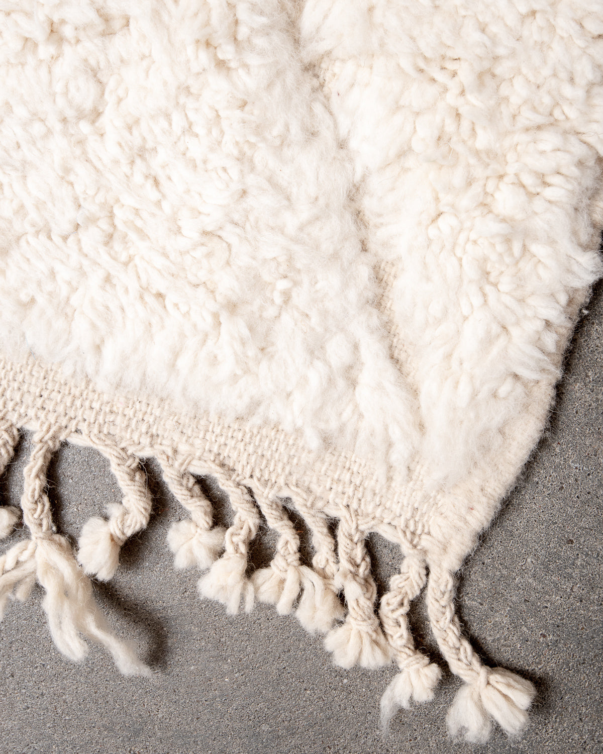 Modern, designer, handcrafted Berber rug from Morocco. Beniourain carpet with minimalist design, natural wool pile and a fluffy texture