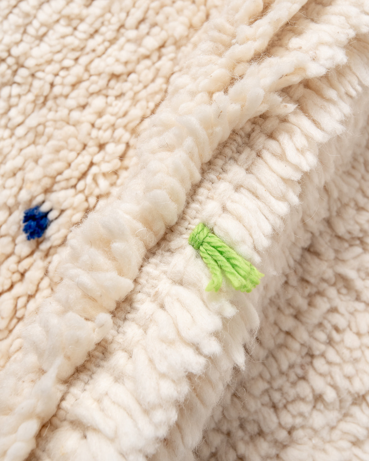 Modern, designer, handcrafted Berber rug from Morocco. Beniourain carpet with beautiful colours and patterns and fluffy wool texture.