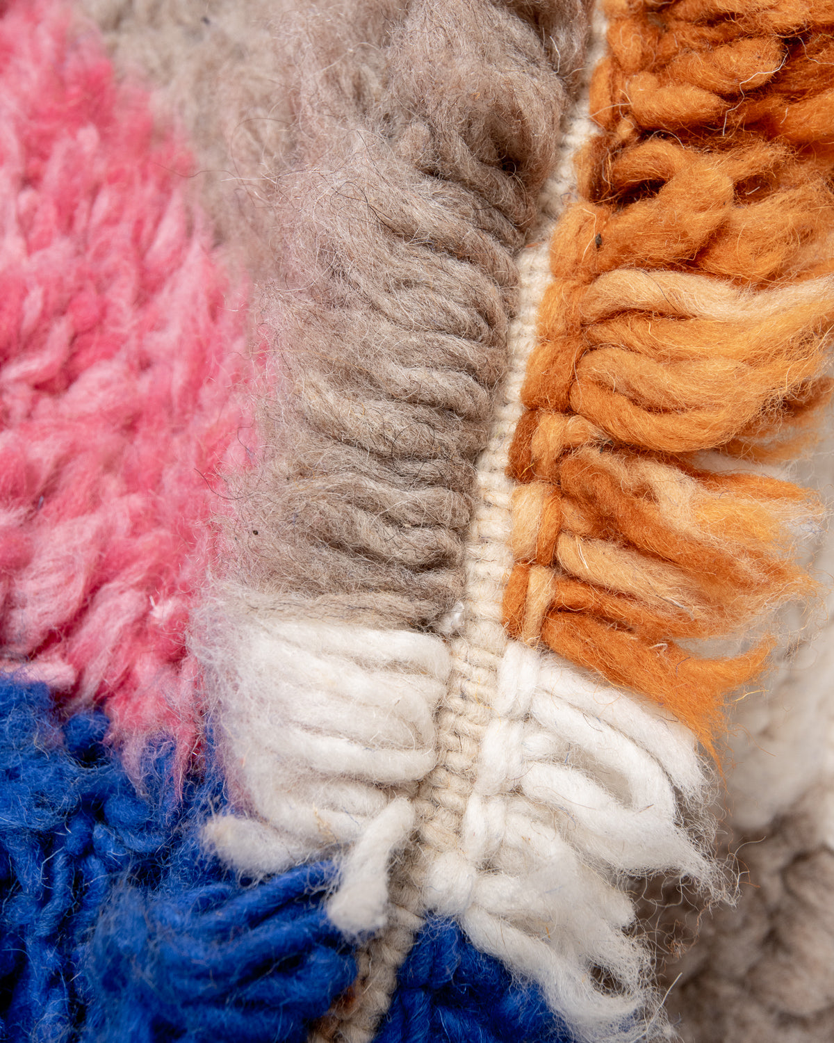 Modern, designer, handcrafted Berber rug from Morocco. Beniourain carpet with beautiful colours and patterns and fluffy wool texture.