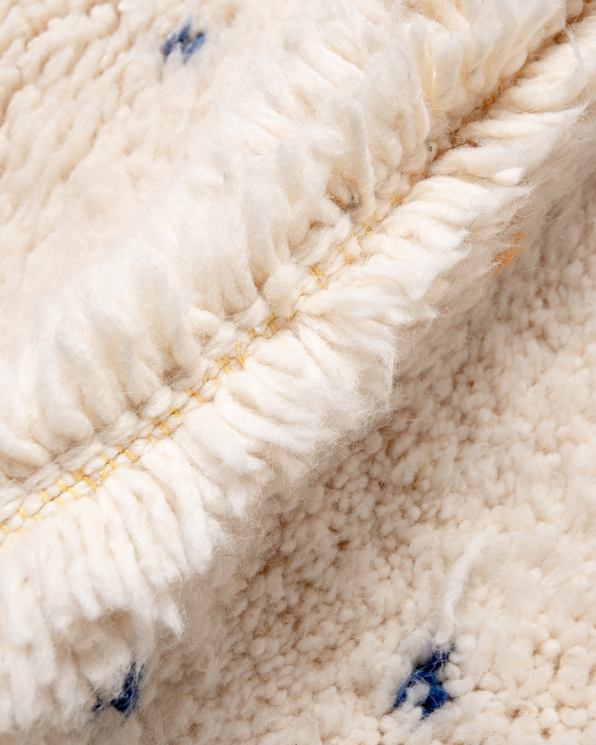 Modern, designer, handcrafted Berber rug from Morocco. Beniourain carpet with beautiful colours and patterns and fluffy wool texture.