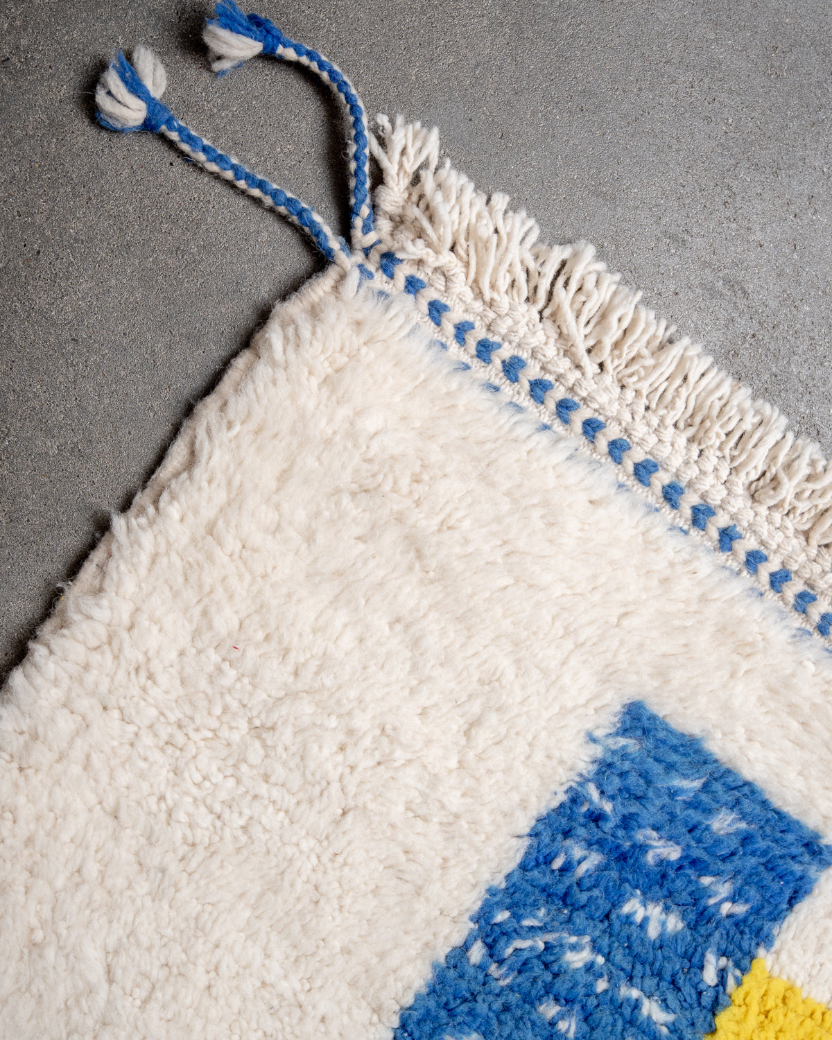Modern, designer, handcrafted Berber rug from Morocco. Beniourain carpet with beautiful colours and patterns and fluffy wool texture.