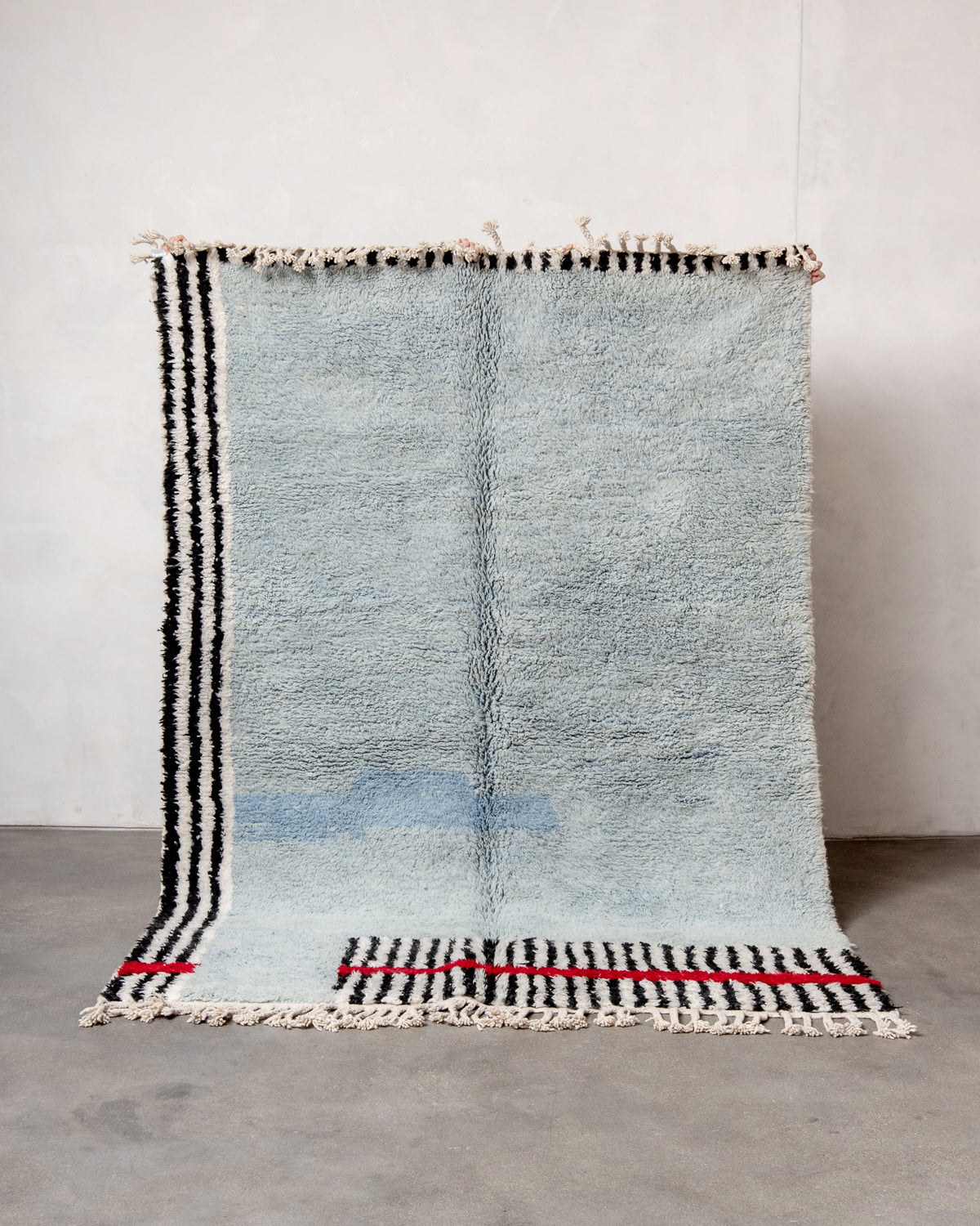 Modern, designer, handcrafted Berber rug from Morocco. Beniourain carpet with beautiful colours and patterns and fluffy wool texture.