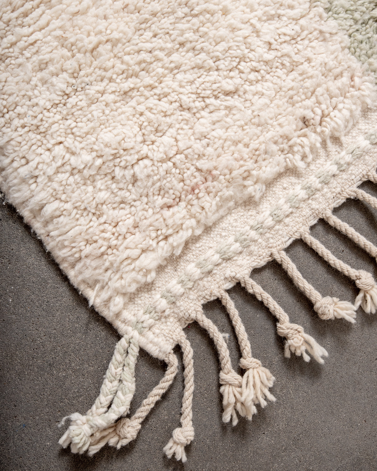 Modern, designer, handcrafted Berber rug from Morocco. Beniourain carpet with beautiful colours and patterns and fluffy wool texture.