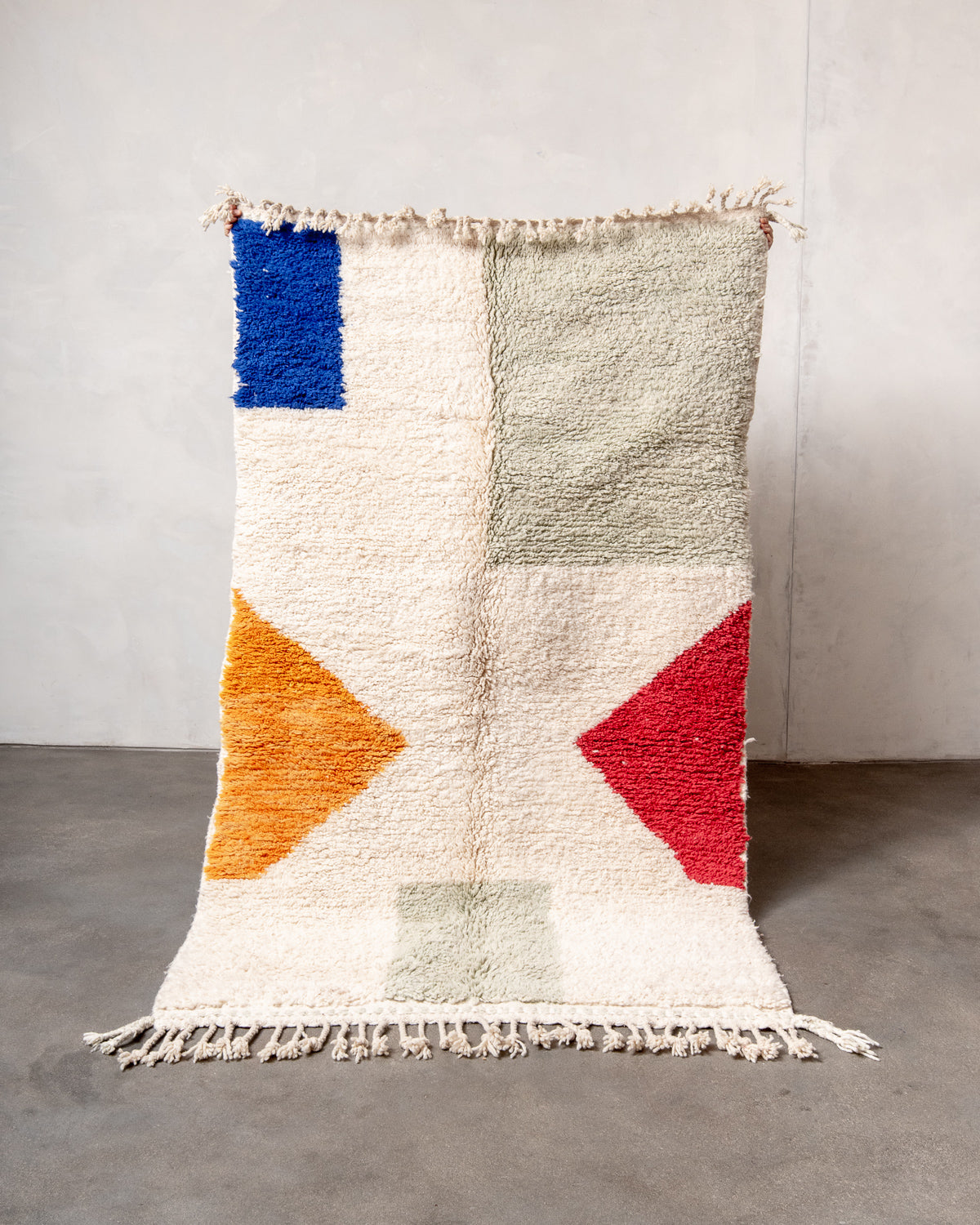 Modern, designer, handcrafted Berber rug from Morocco. Beniourain carpet with beautiful colours and patterns and fluffy wool texture.