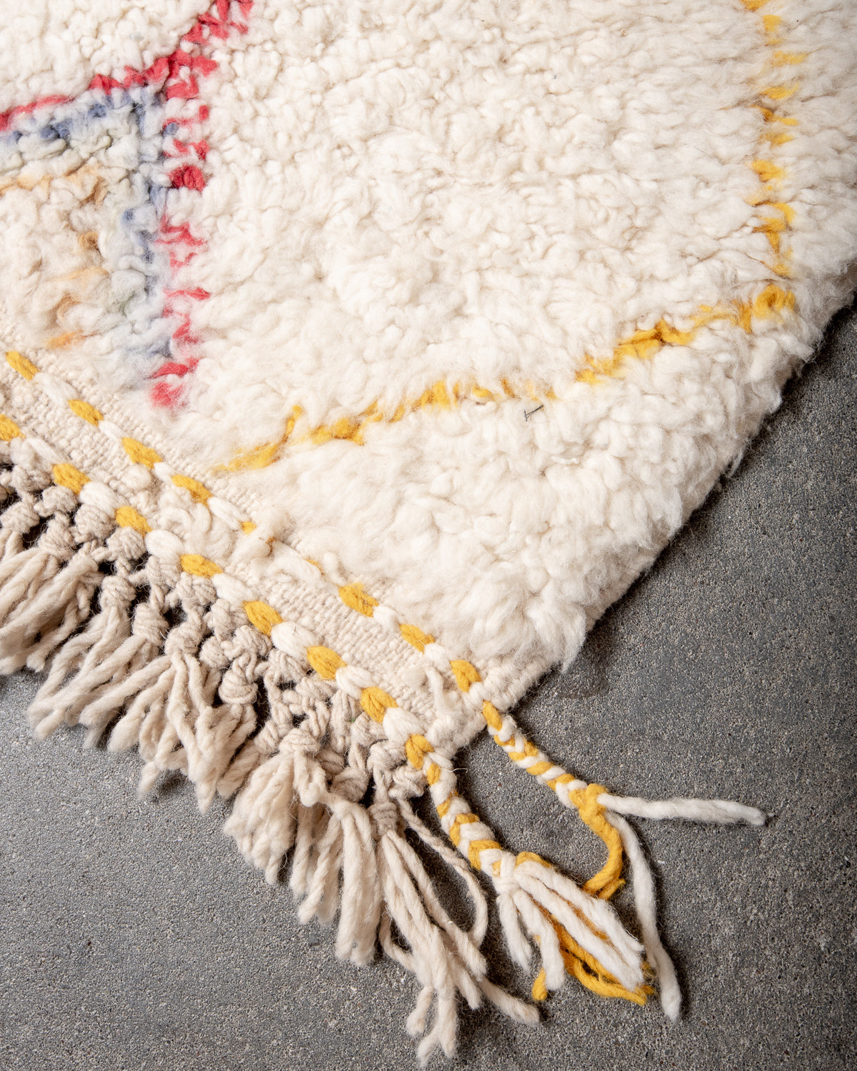 Modern, designer, handcrafted Berber rug from Morocco. Beniourain carpet with beautiful colours and patterns and fluffy wool texture.