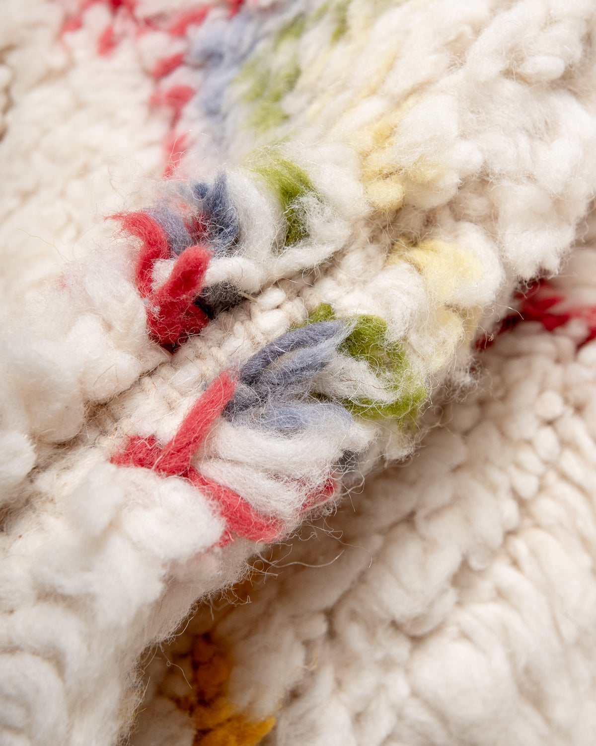 Modern, designer, handcrafted Berber rug from Morocco. Beniourain carpet with beautiful colours and patterns and fluffy wool texture.