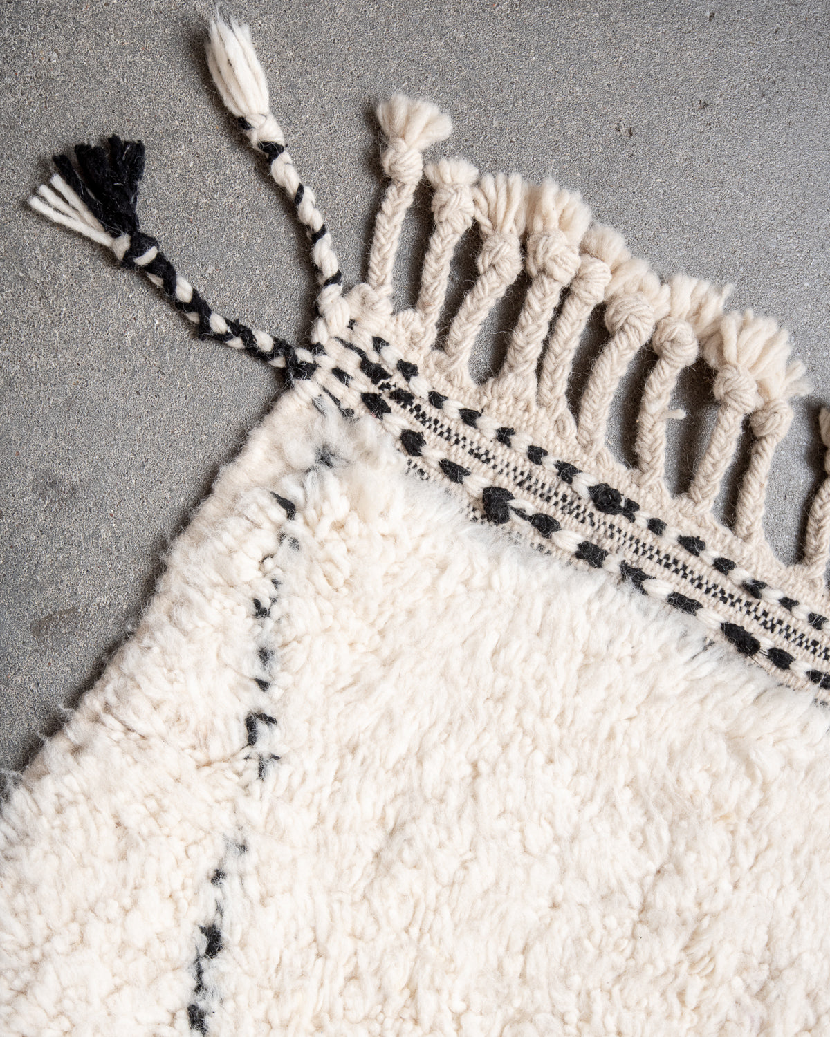 Modern, designer, handcrafted Berber rug from Morocco. Beniourain carpet with minimalist design, natural wool pile and a fluffy texture.