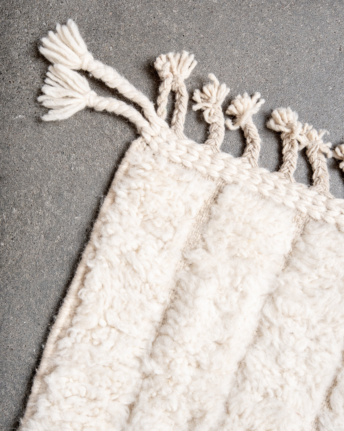 Modern, designer, handcrafted Berber rug from Morocco. Beniourain carpet with minimalist design, natural wool pile and a fluffy texture.