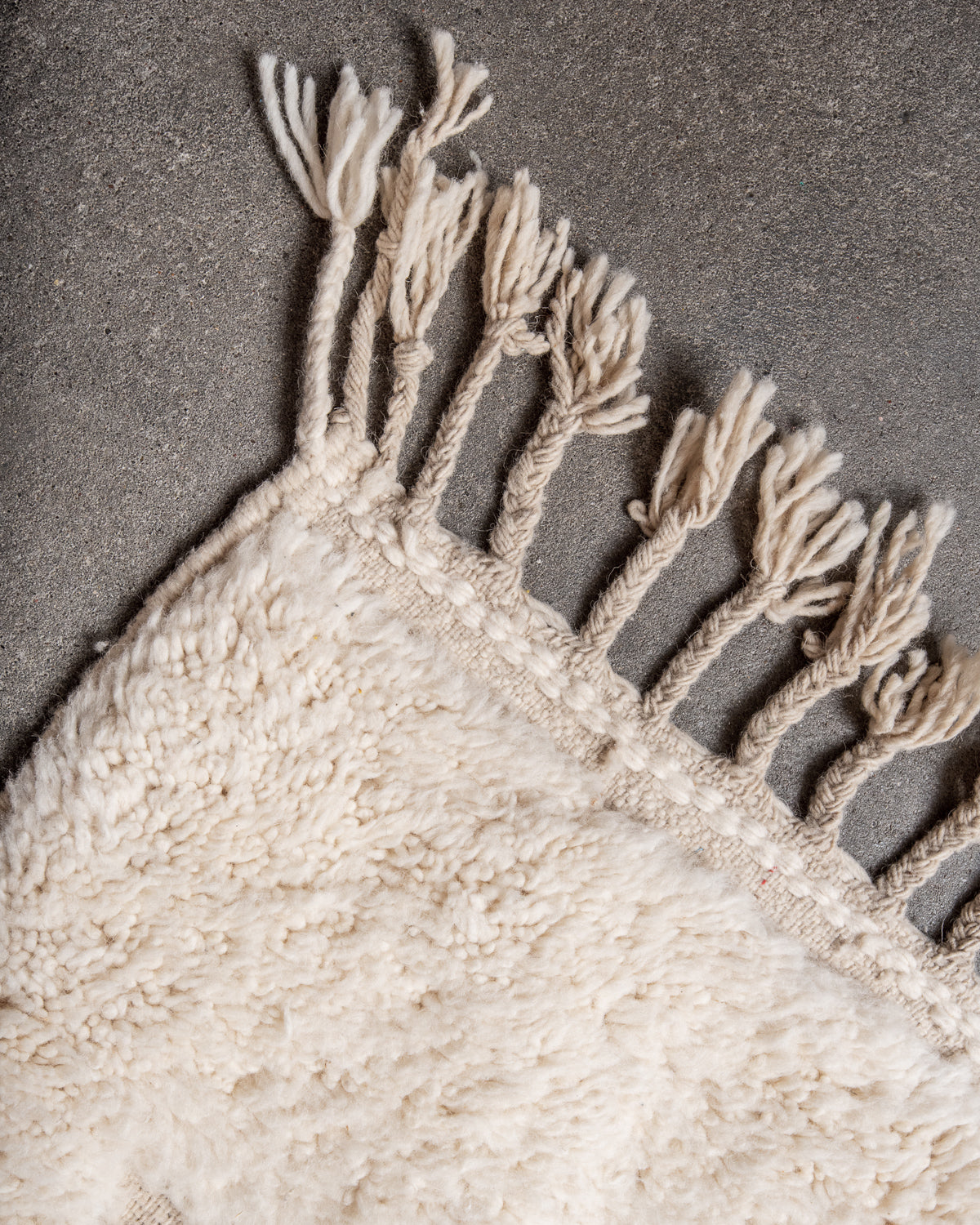 Modern, designer, handcrafted Berber rug from Morocco. Beniourain carpet with minimalist design, natural wool pile and a fluffy texture.