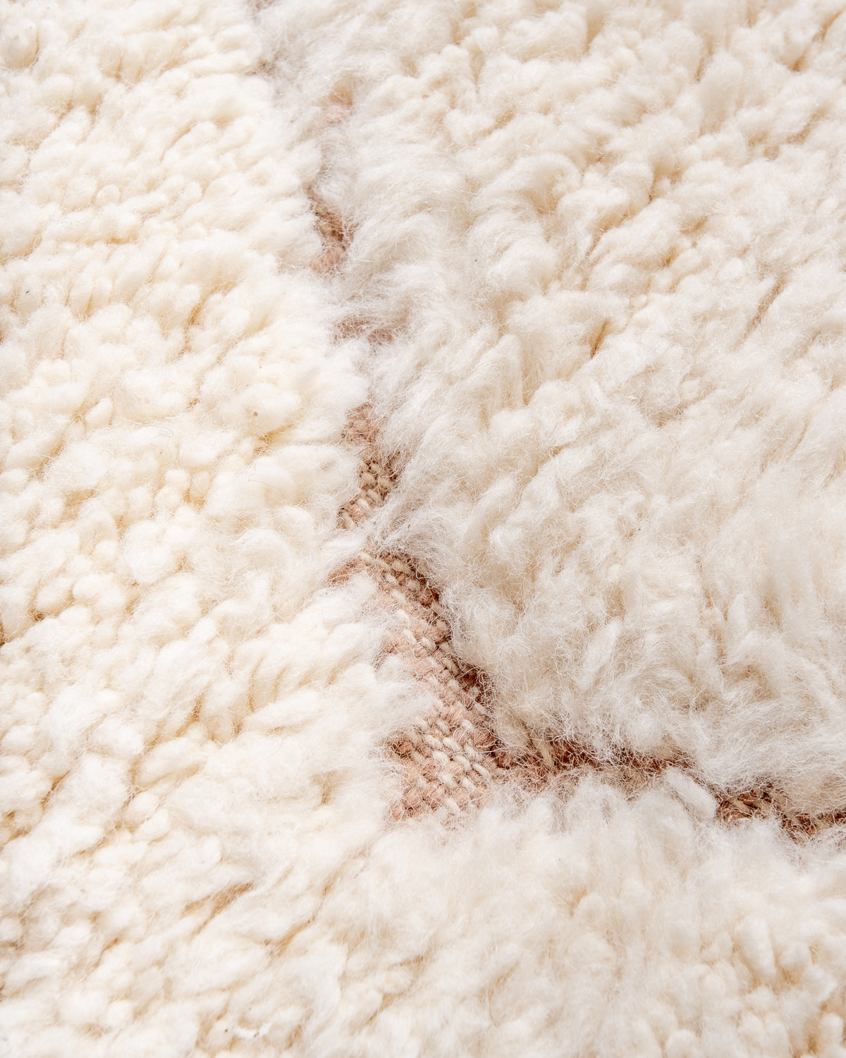 Modern, designer, handcrafted Berber rug from Morocco. Beniourain carpet with minimalist design, natural wool pile and a fluffy texture.