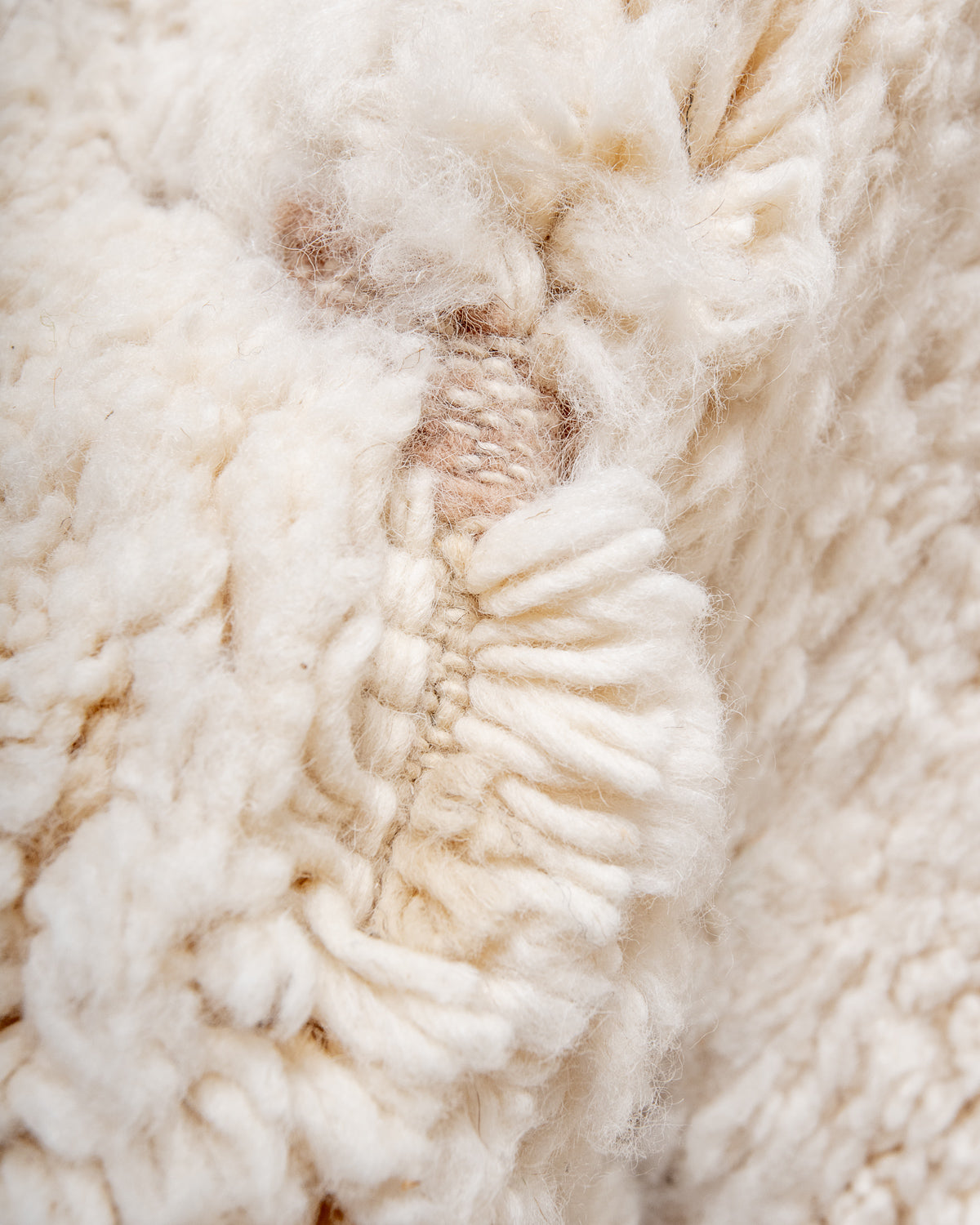 Modern, designer, handcrafted Berber rug from Morocco. Beniourain carpet with minimalist design, natural wool pile and a fluffy texture.