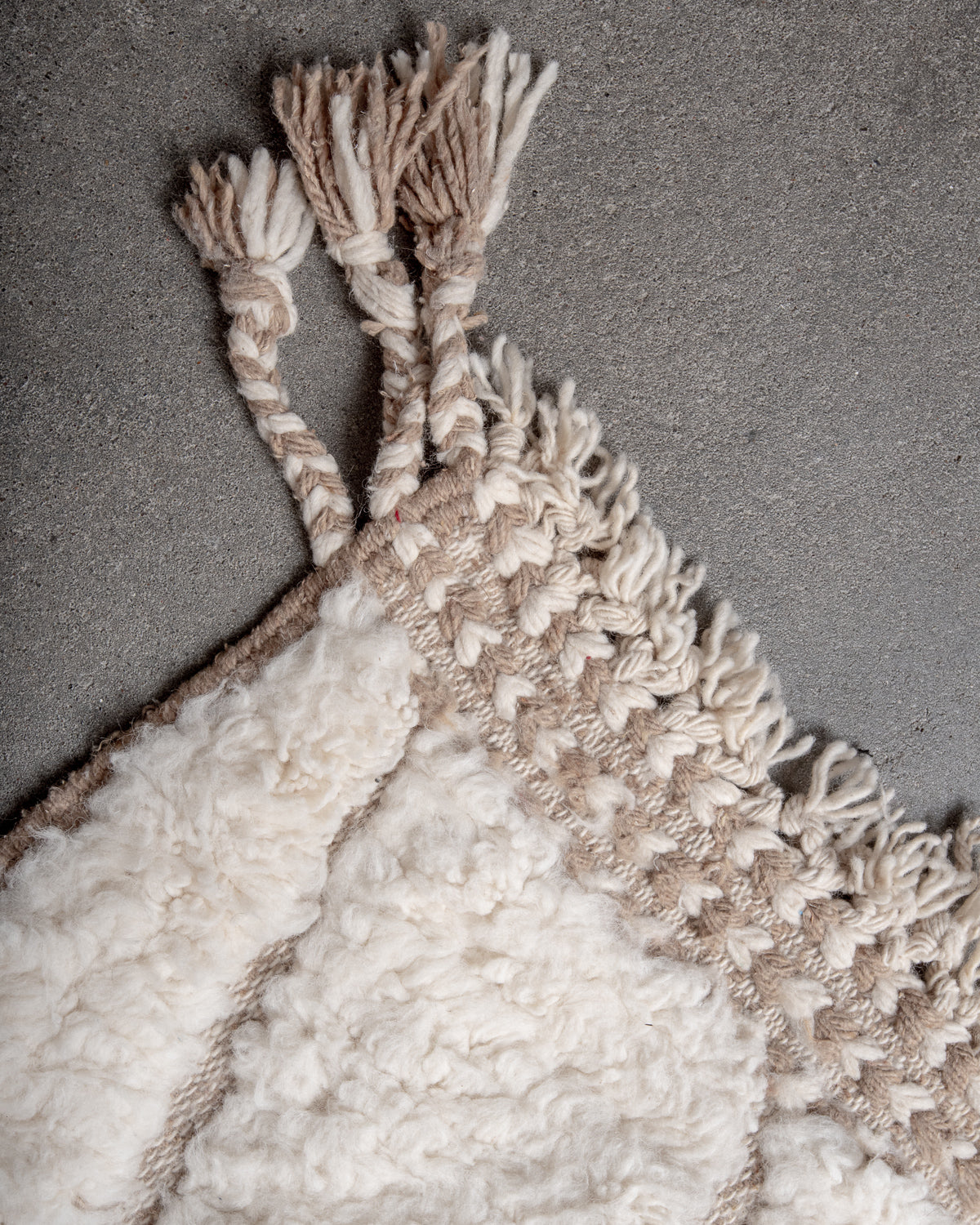 Modern, designer, handcrafted Berber rug from Morocco. Beniourain carpet with minimalist design, natural wool pile and a fluffy texture.