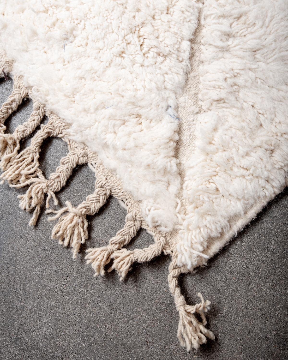 Modern, designer, handcrafted Berber rug from Morocco. Beniourain carpet with minimalist design, natural wool pile and a fluffy texture.