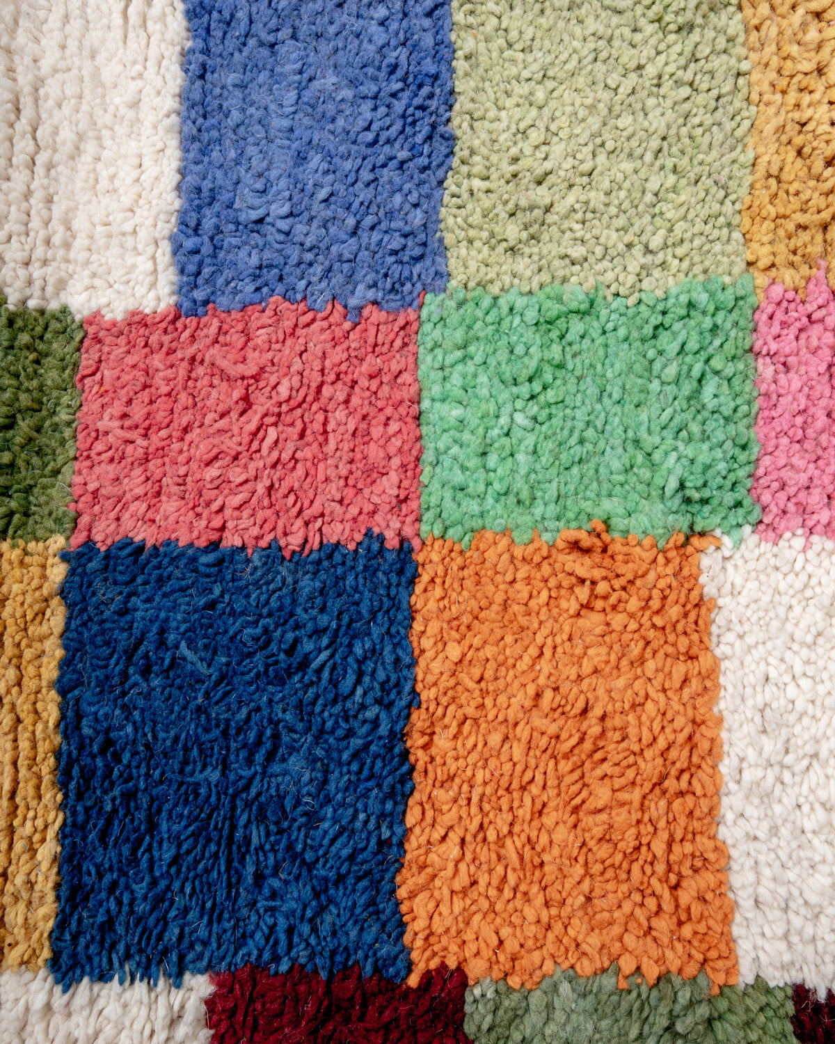 Modern, designer, handcrafted Berber runner rug from Morocco. Beniourain carpet with beautiful colours and patterns and fluffy wool texture.