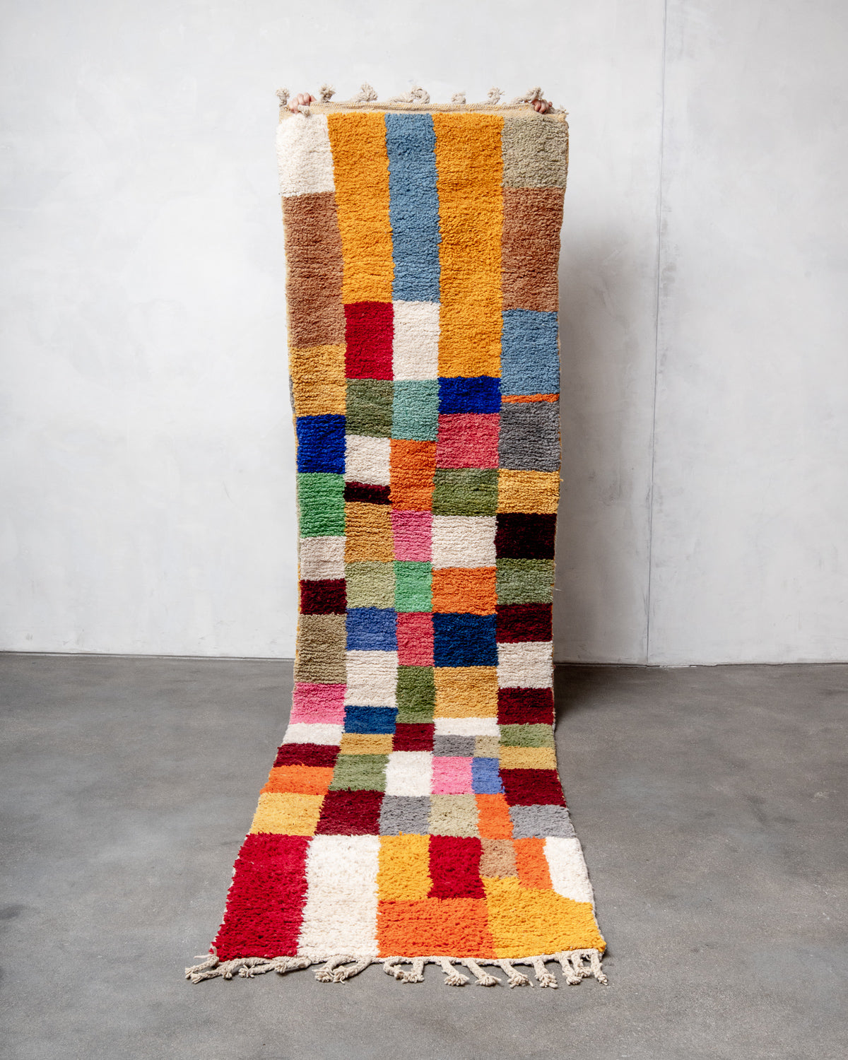 Modern, designer, handcrafted Berber runner rug from Morocco. Beniourain carpet with beautiful colours and patterns and fluffy wool texture.