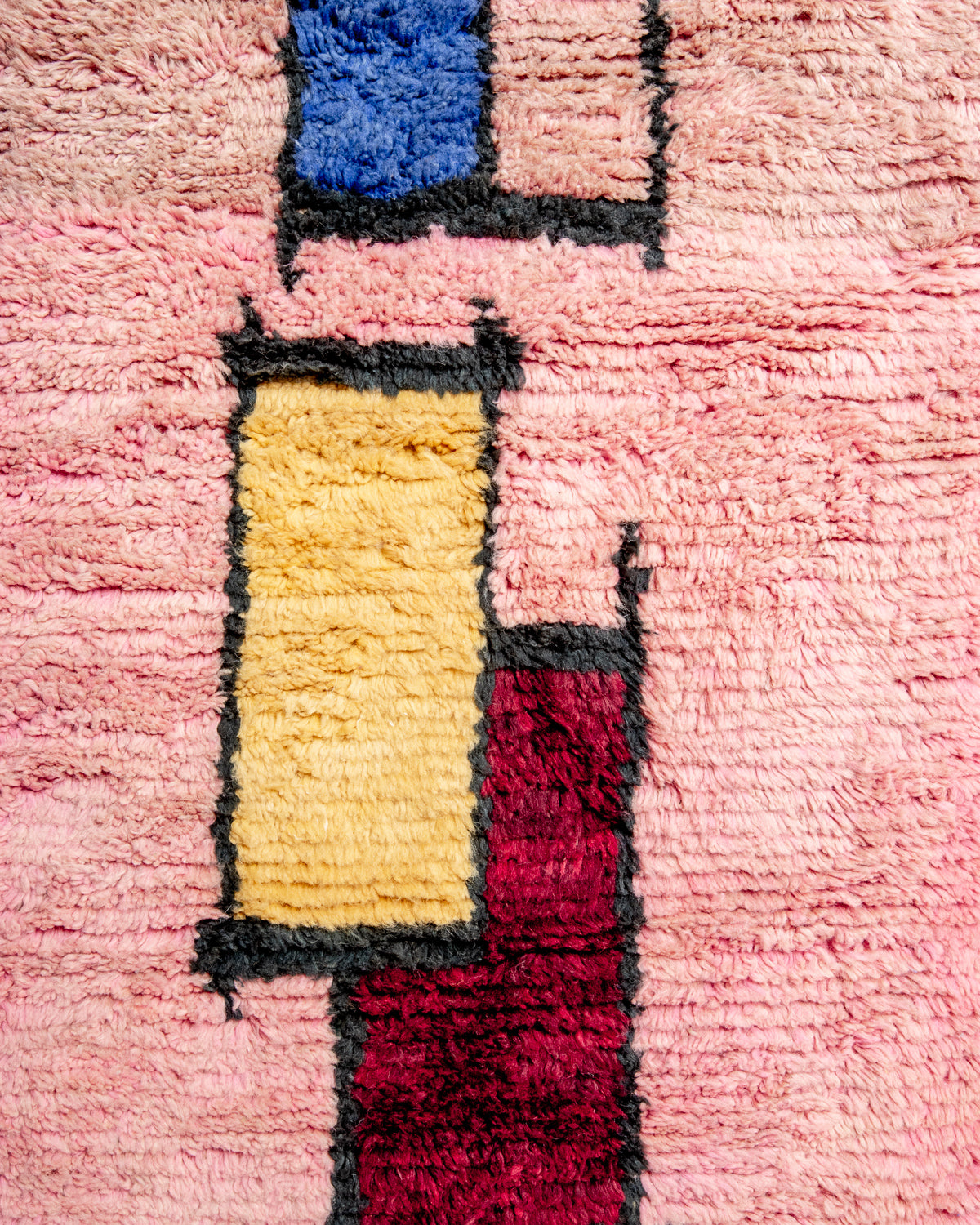 Modern, designer, handcrafted Berber runner rug from Morocco. Beniourain carpet with beautiful colours and patterns and fluffy wool texture.