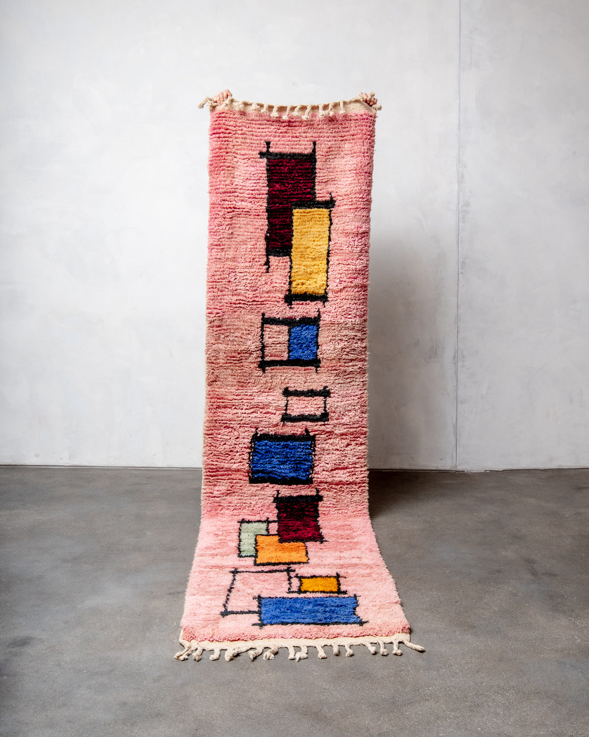 Modern, designer, handcrafted Berber runner rug from Morocco. Beniourain carpet with beautiful colours and patterns and fluffy wool texture.