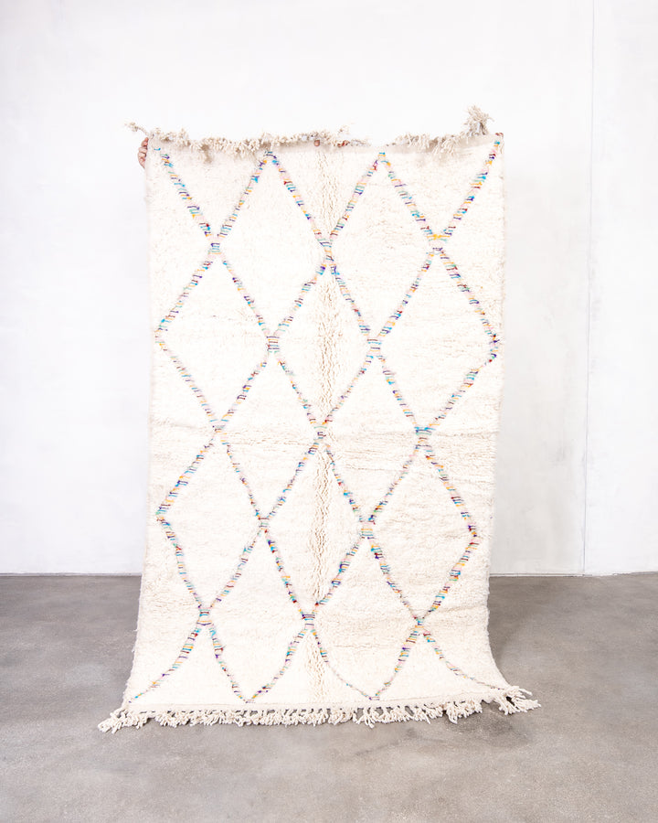 Modern, designer, handcrafted Berber rug from Morocco. Beniourain carpet with beautiful colours and patterns and fluffy wool texture.