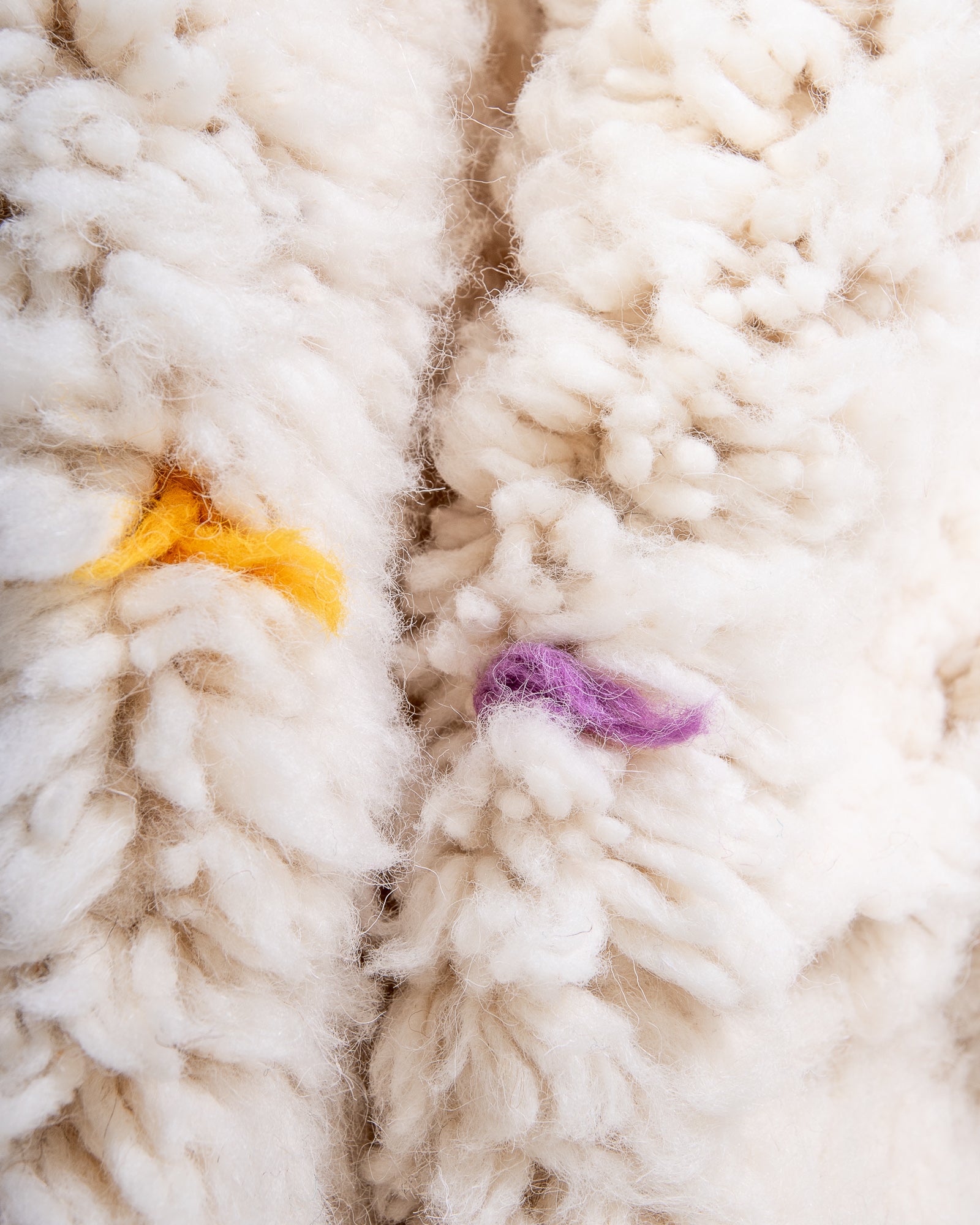 Modern, designer, handcrafted Berber rug from Morocco. Beniourain carpet with beautiful colours and patterns and fluffy wool texture.