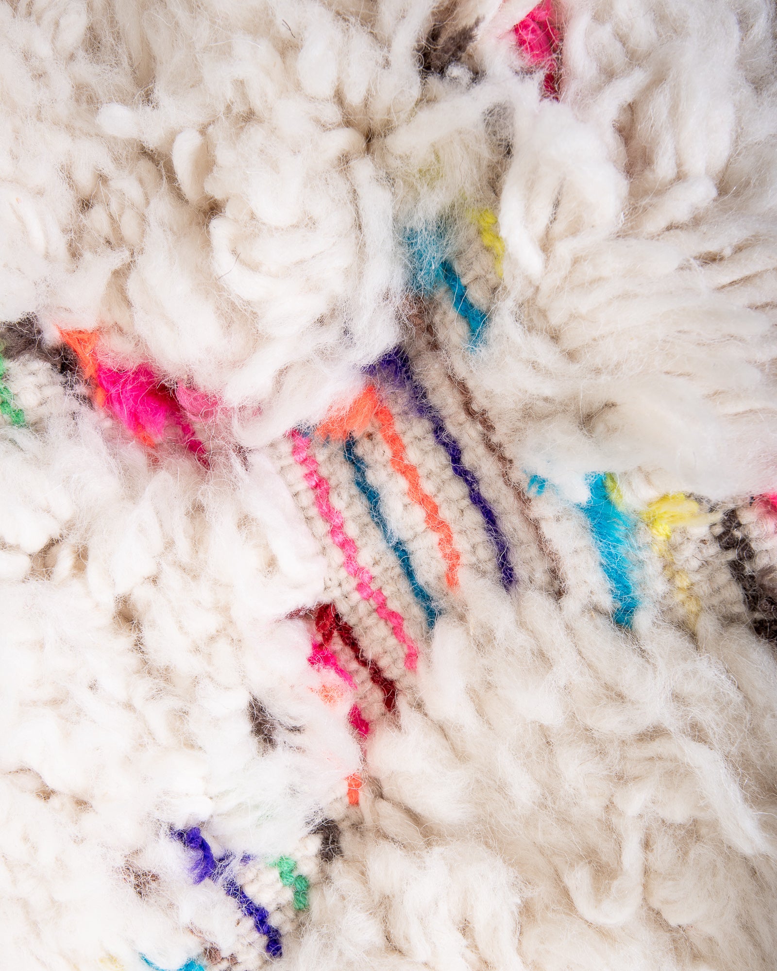 Modern, designer, handcrafted Berber rug from Morocco. Beniourain carpet with beautiful colours and patterns and fluffy wool texture.