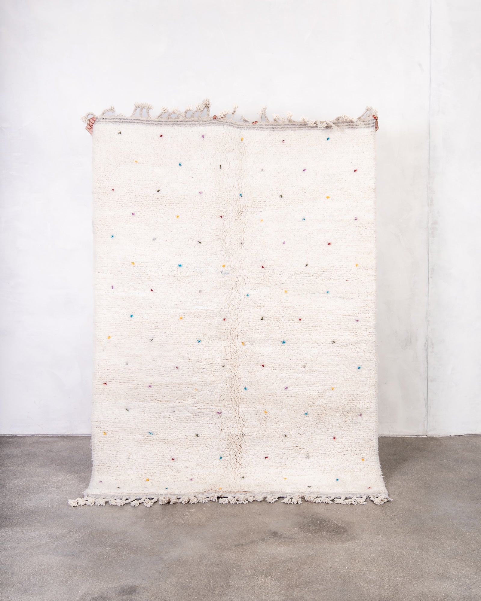 Modern, designer, handcrafted Berber rug from Morocco. Beniourain carpet with beautiful colours and patterns and fluffy wool texture.