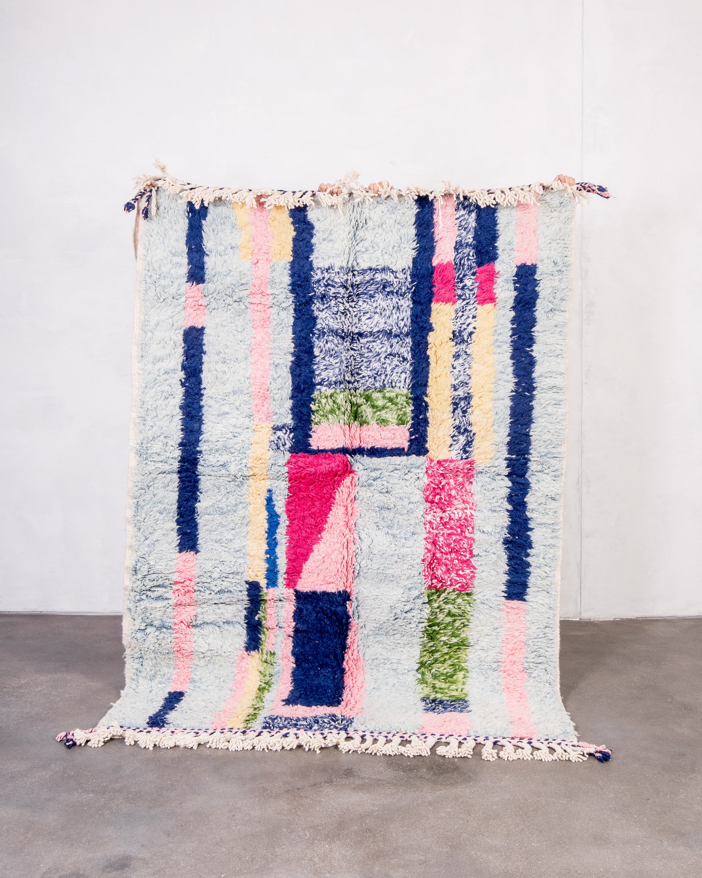 Modern, designer, handcrafted Berber rug from Morocco. Beniourain carpet with beautiful colors and patterns and fluffy wool texture.