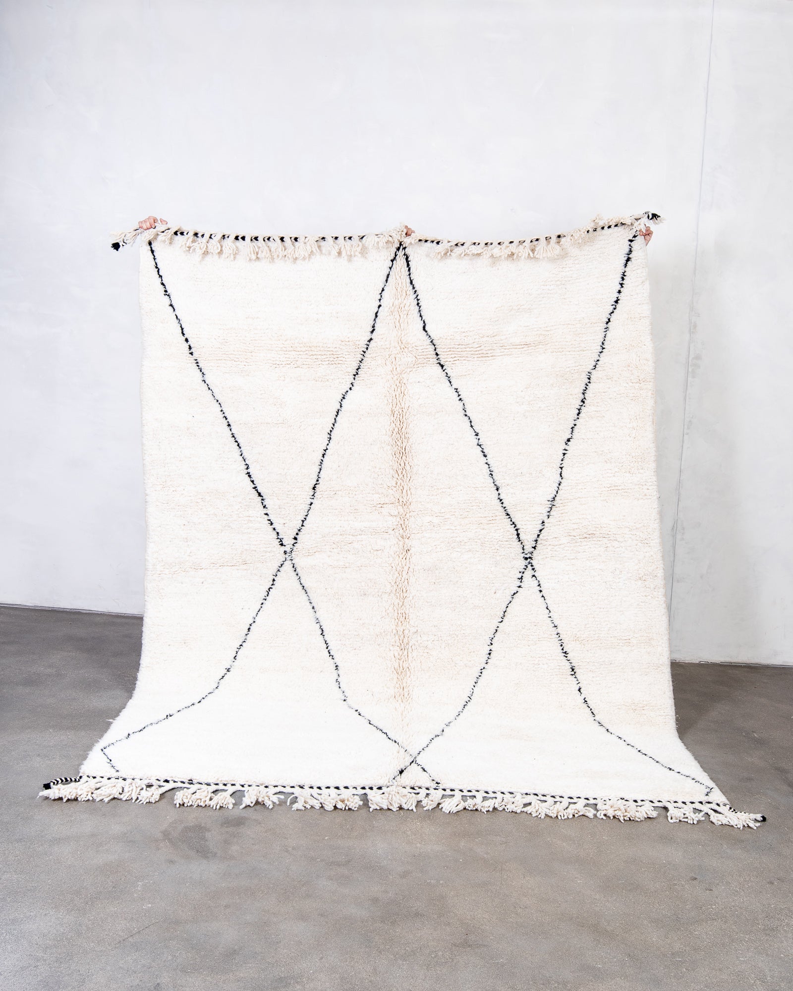 Modern, designer, handcrafted Berber rug from Morocco. Beniourain carpet with beautiful colours and patterns and fluffy wool texture.