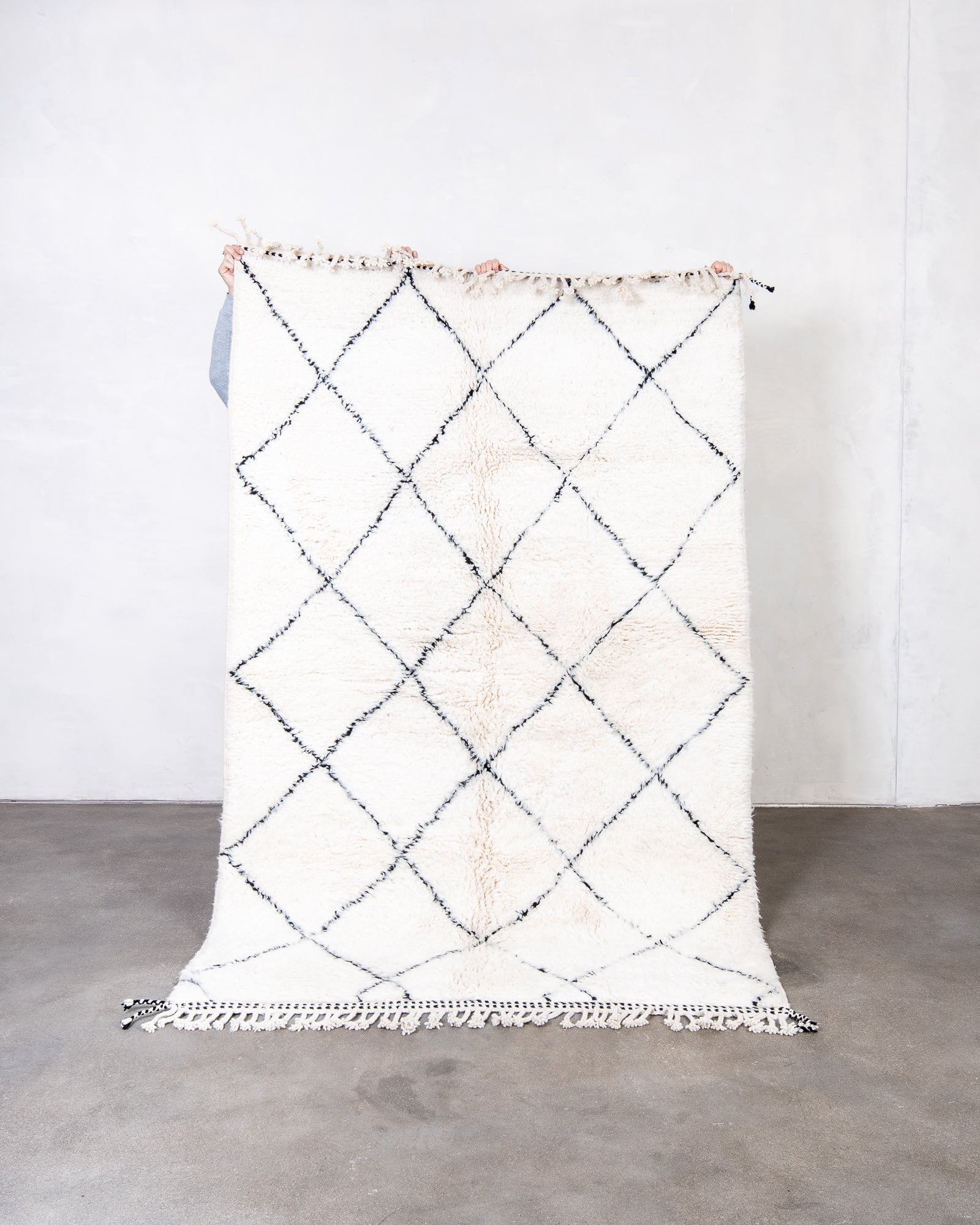 Modern, designer, handcrafted Berber rug from Morocco. Beniourain carpet with beautiful colours and patterns and fluffy wool texture.