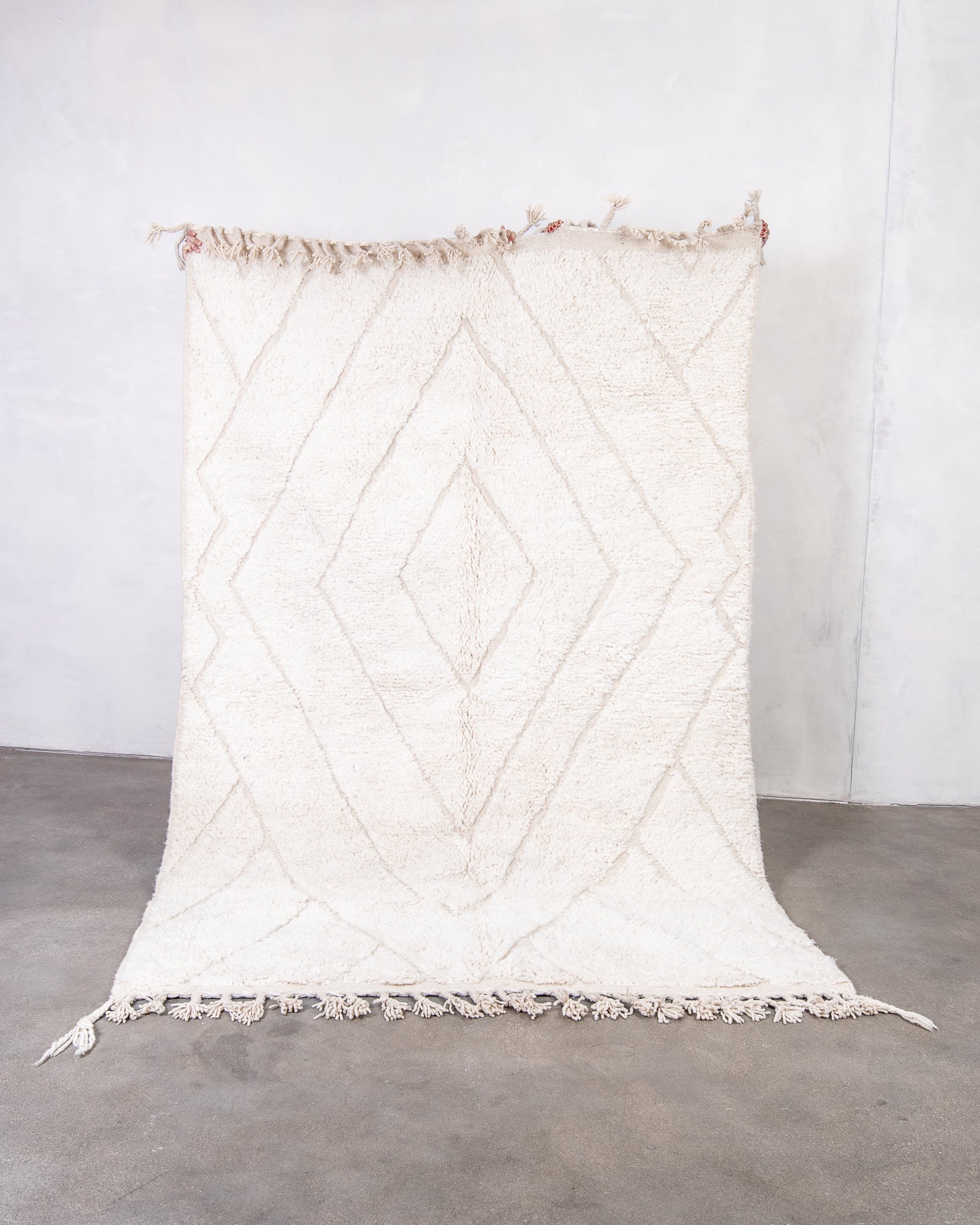 Modern, designer, handcrafted Berber rug from Morocco. Beniourain carpet with beautiful colours and patterns and fluffy wool texture.