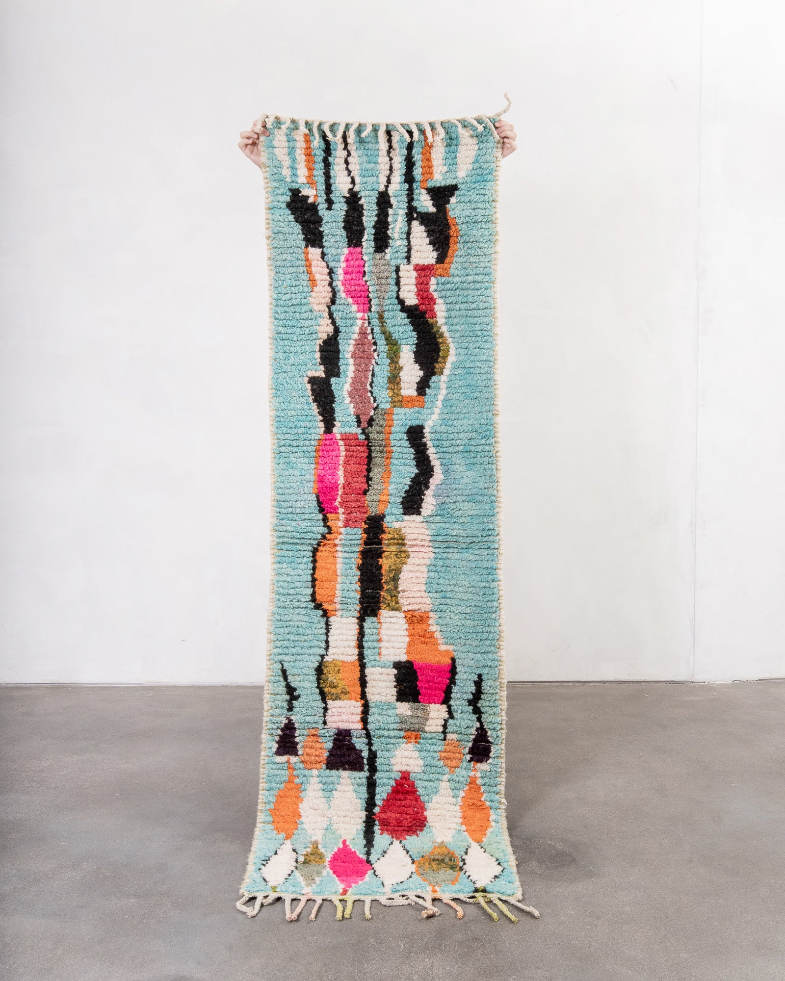 Vintage, handcrafted Berber rug from Morocco. Boucherouite carpet with beautiful colours and patterns and heavy cotton texture.