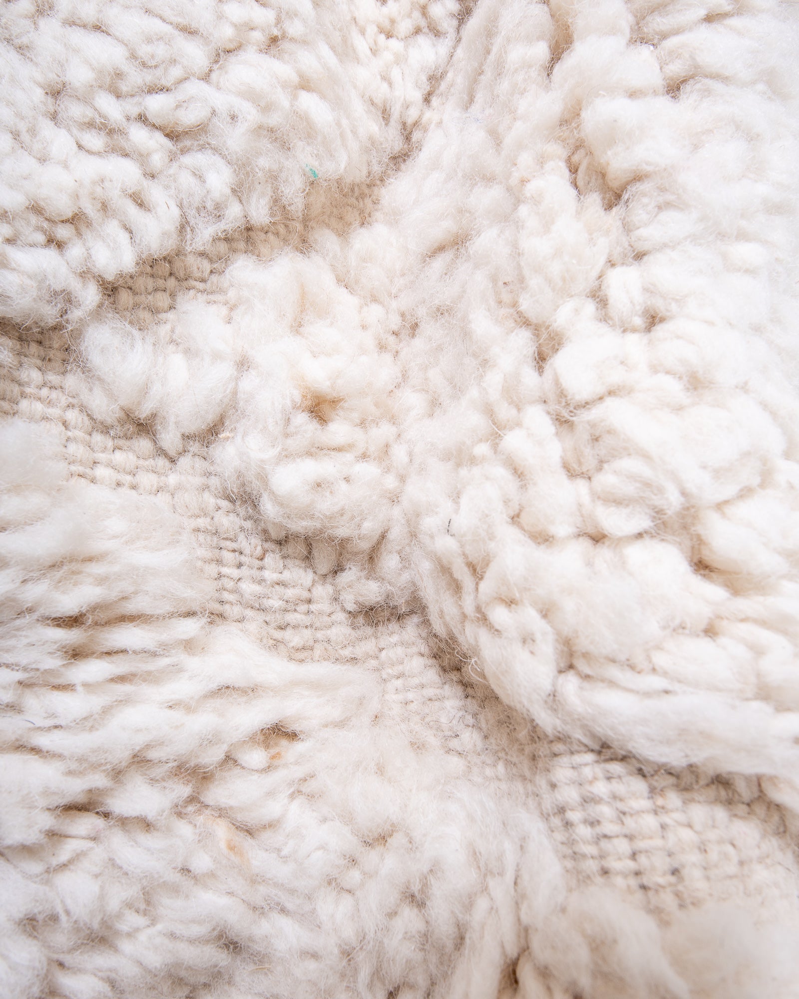 Modern, designer, handcrafted Berber rug from Morocco. Beniourain carpet with beautiful colours and patterns and fluffy wool texture.