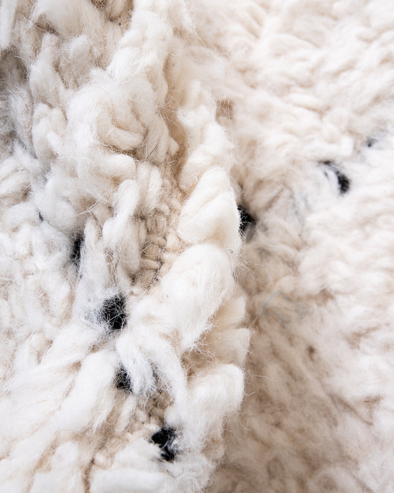 Modern, designer, handcrafted Berber rug from Morocco. Beniourain carpet with beautiful colours and patterns and fluffy wool texture.