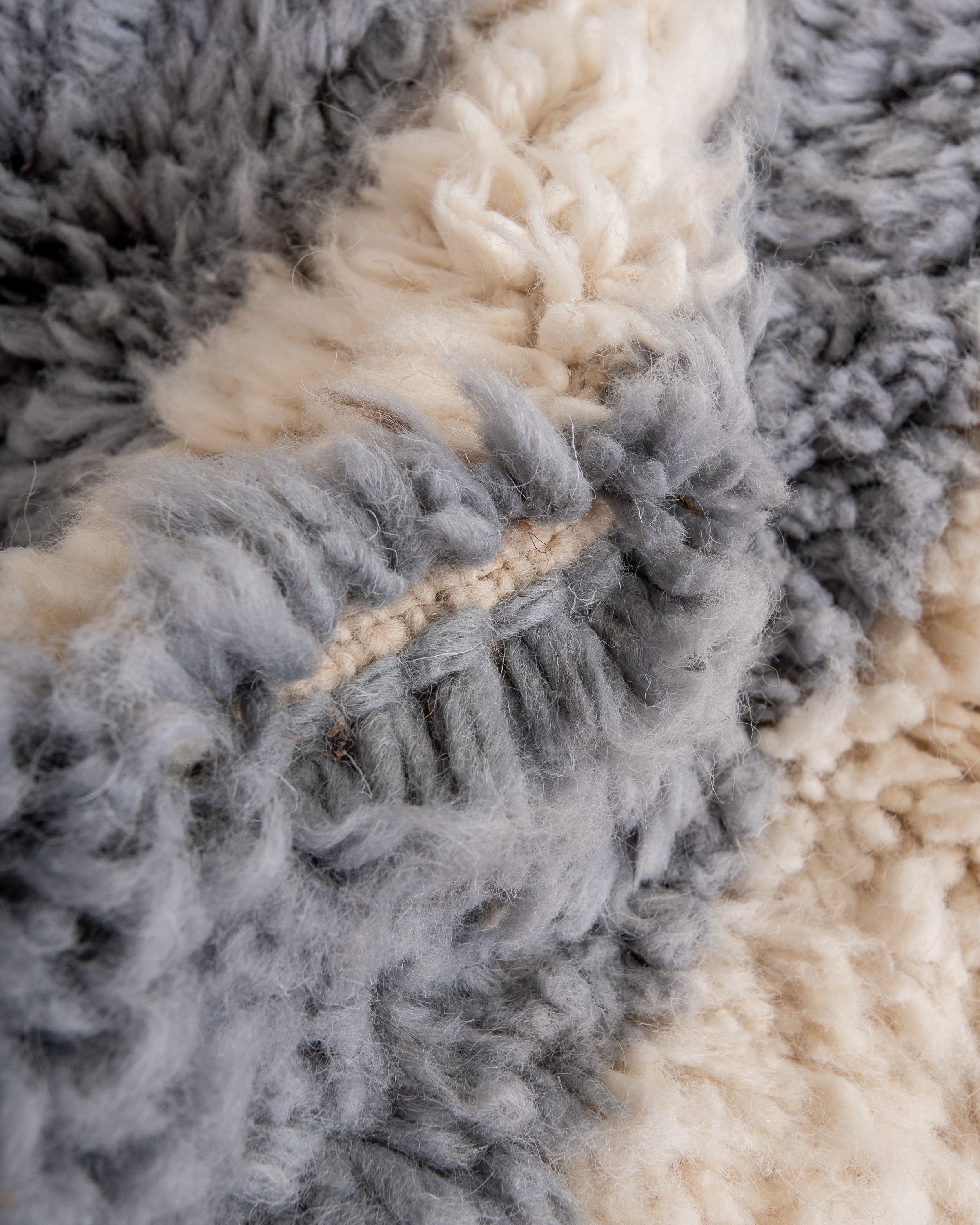 Modern, designer, handcrafted Berber rug from Morocco. Beniourain carpet with beautiful colors and patterns and fluffy wool texture.