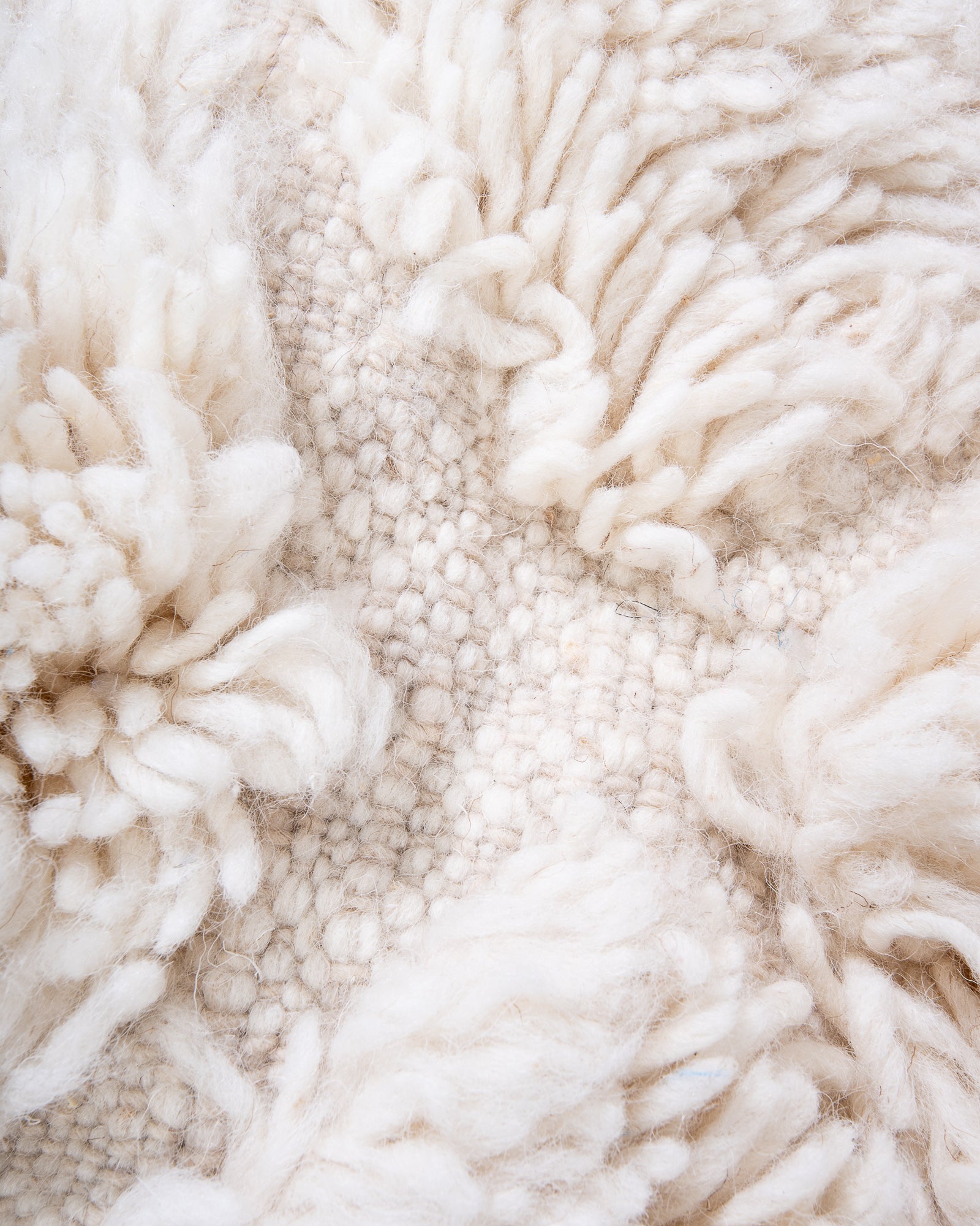 Modern, designer, handcrafted Berber rug from Morocco. Beniourain carpet with beautiful colours and patterns and fluffy wool texture.