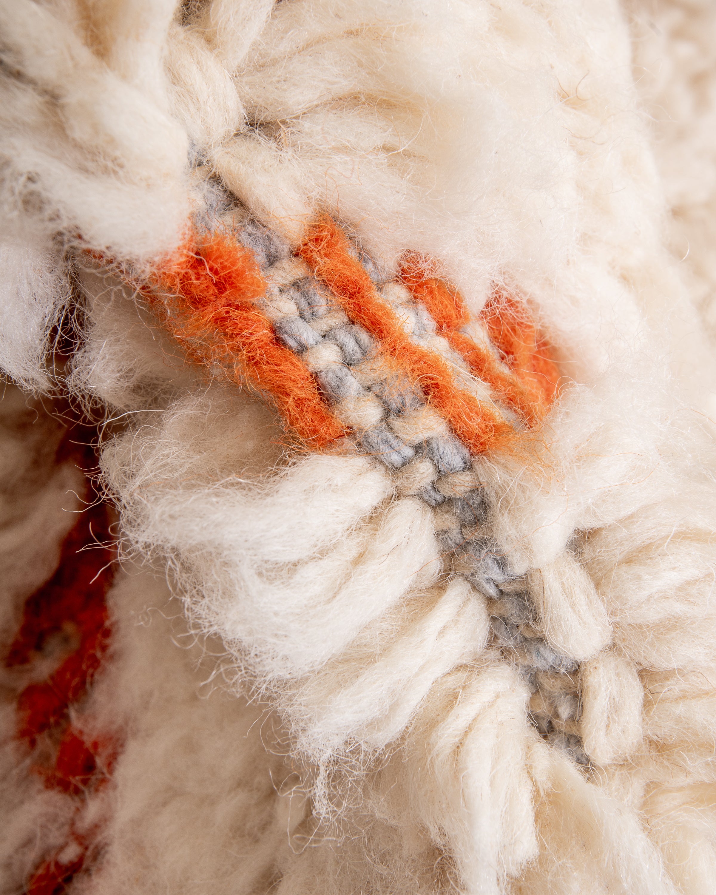 Modern, designer, handcrafted Berber rug from Morocco. Beniourain carpet with beautiful colors and patterns and fluffy wool texture.