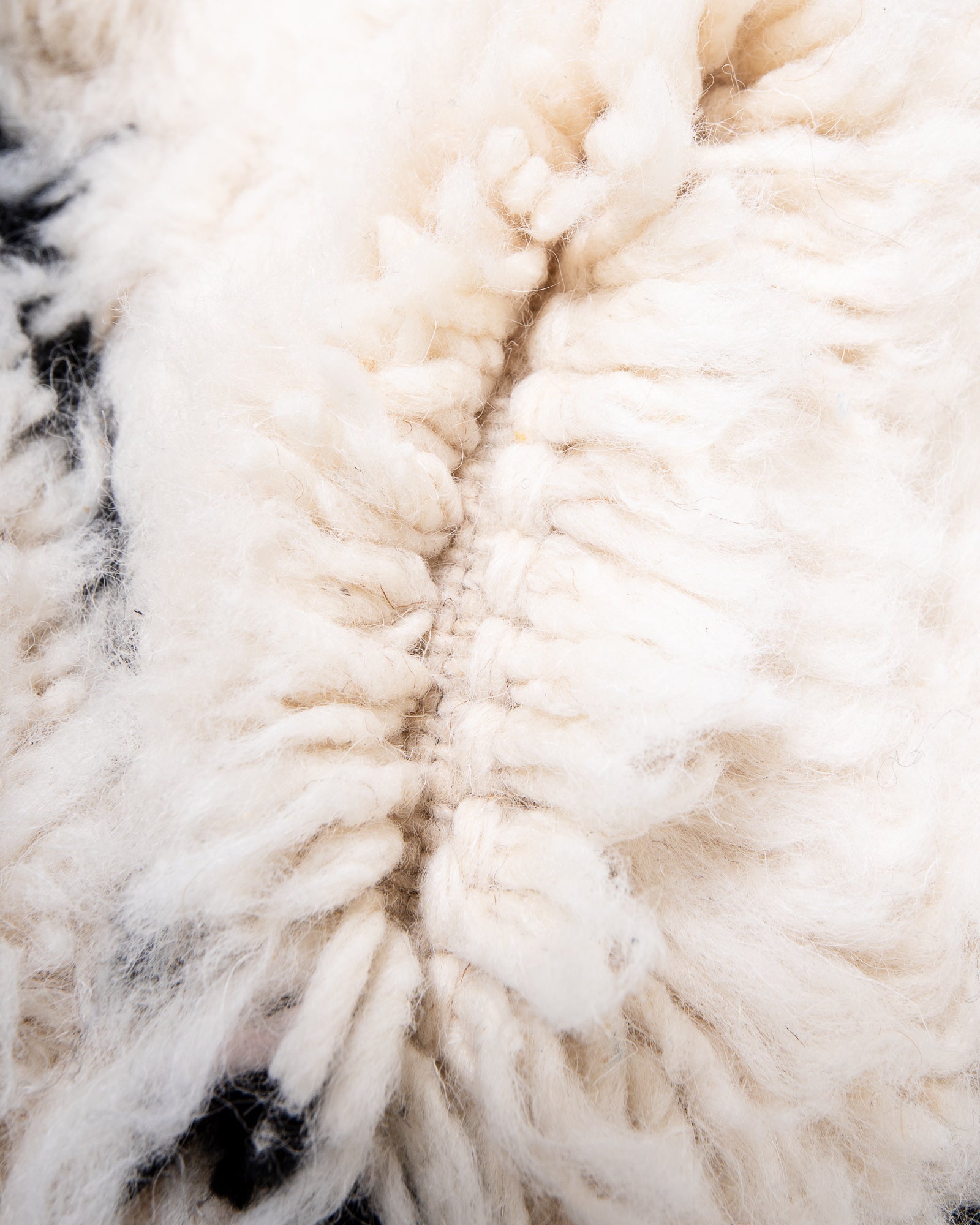 Modern, designer, handcrafted Berber rug from Morocco. Beniourain carpet with beautiful colours and patterns and fluffy wool texture.