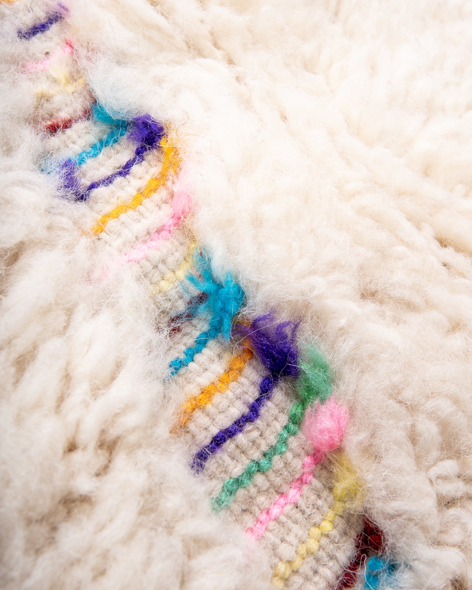 Modern, designer, handcrafted Berber rug from Morocco. Beniourain carpet with beautiful colours and patterns and fluffy wool texture.