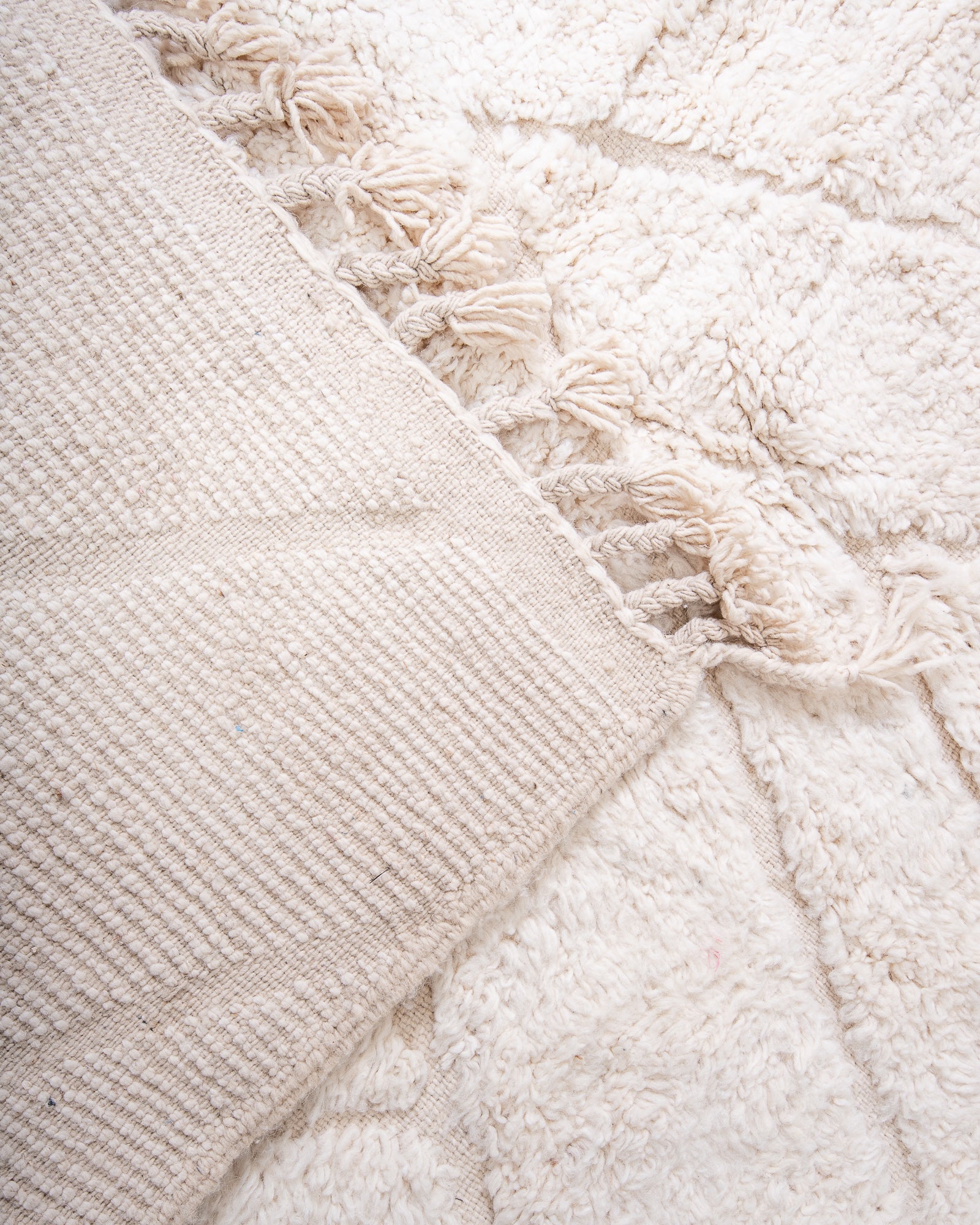 Modern, designer, handcrafted Berber rug from Morocco. Beniourain carpet with beautiful colours and patterns and fluffy wool texture.