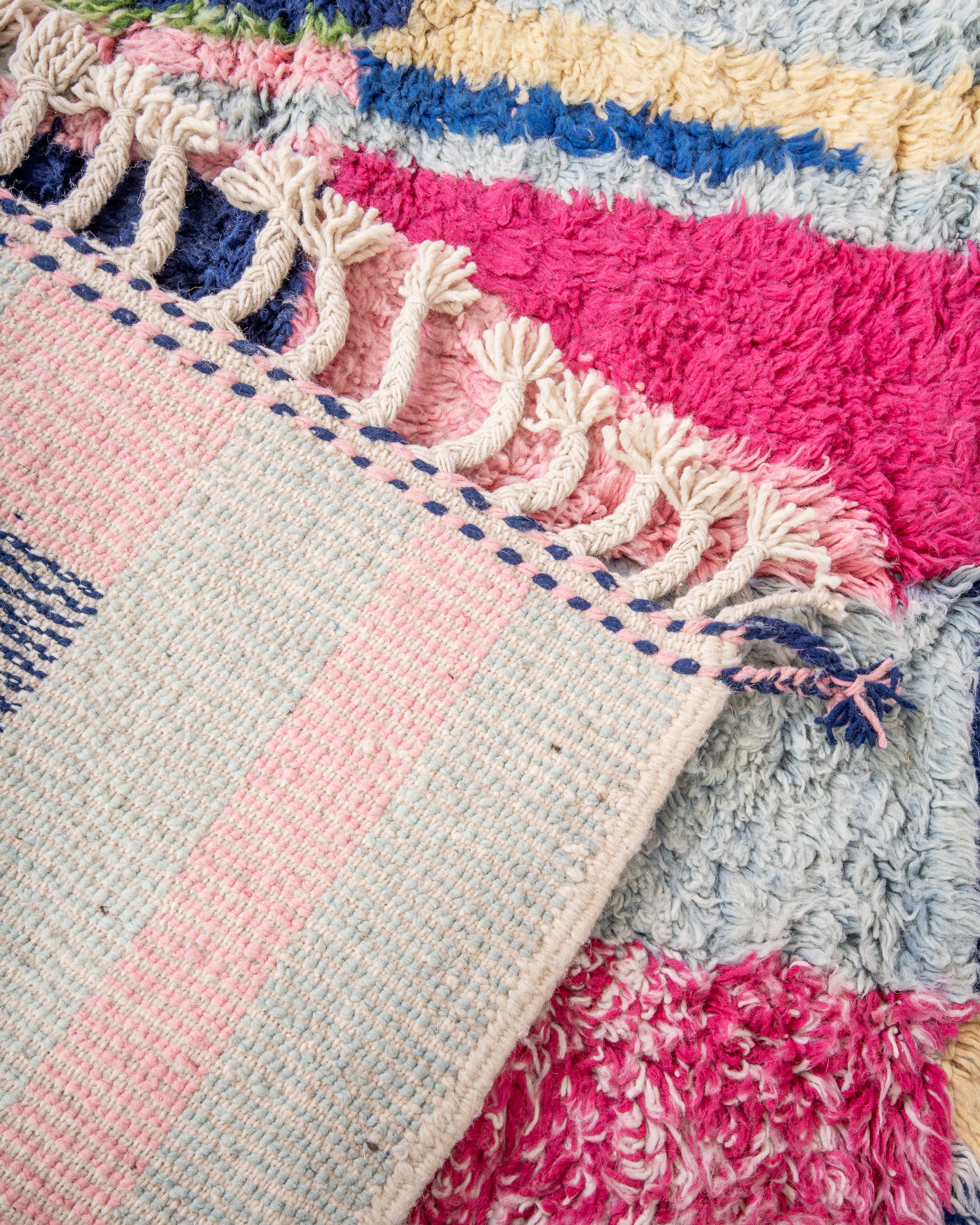 Modern, designer, handcrafted Berber rug from Morocco. Beniourain carpet with beautiful colors and patterns and fluffy wool texture.